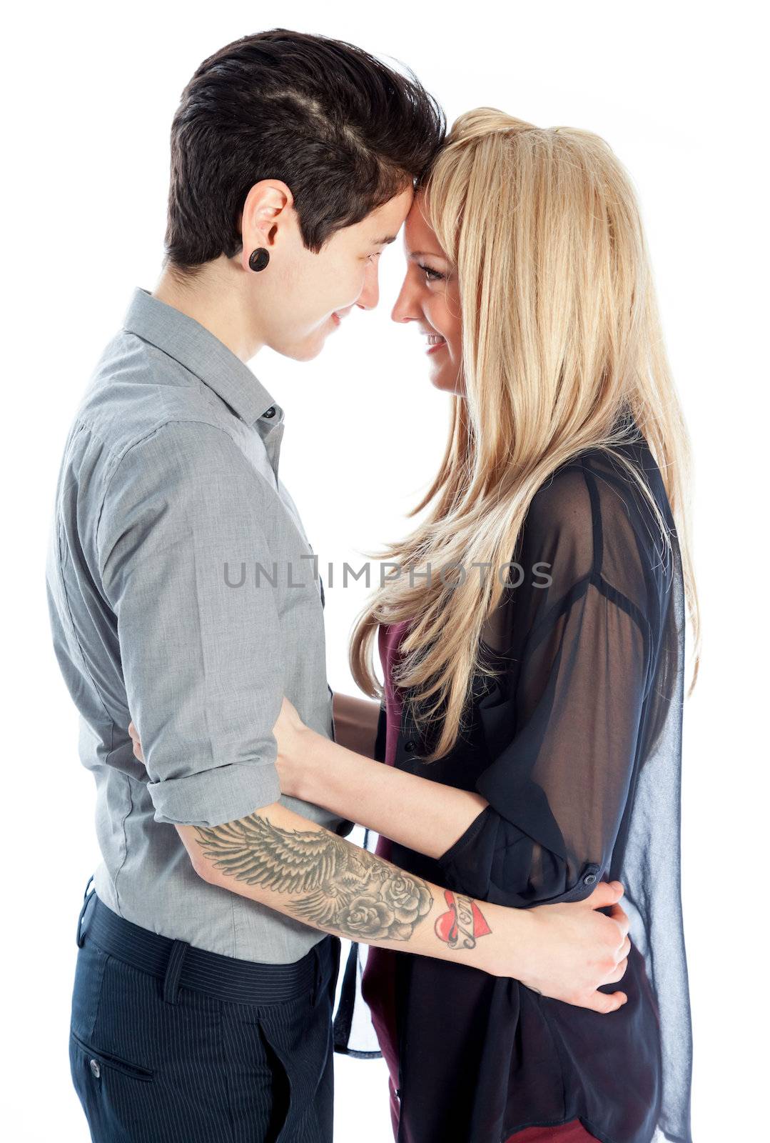Cute Lesbian couple 30 years old shot in studio isolated on a white background