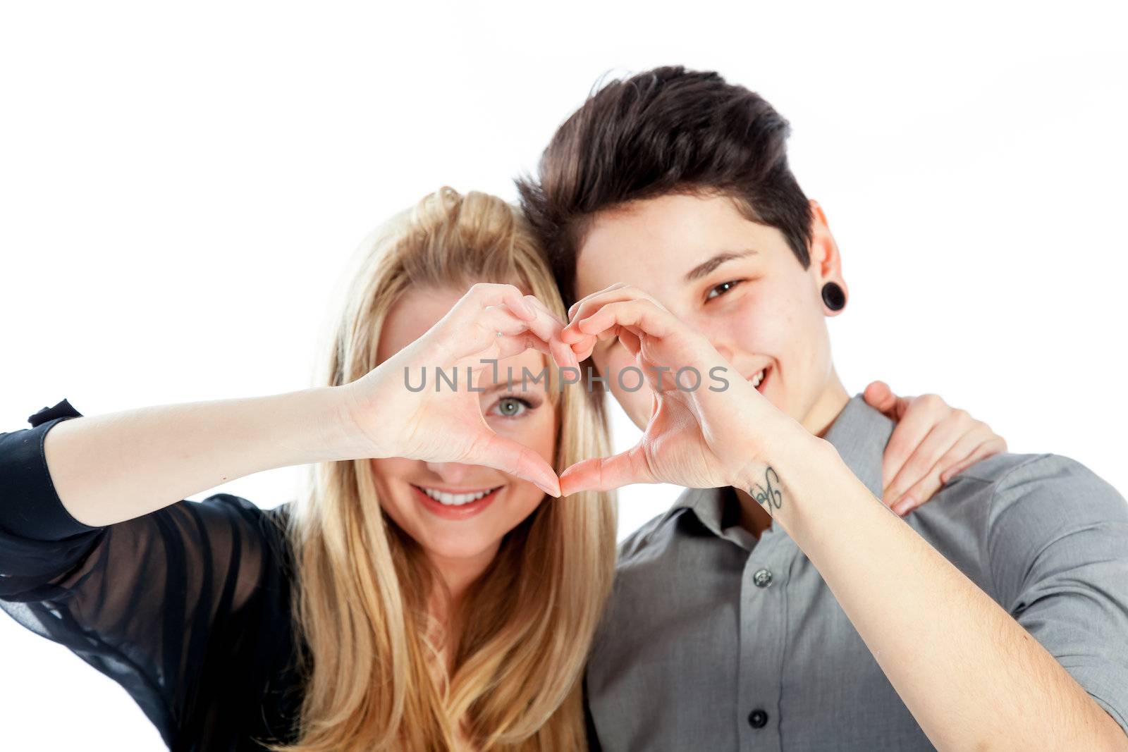 Cute Lesbian couple 30 years old shot in studio isolated on a white background