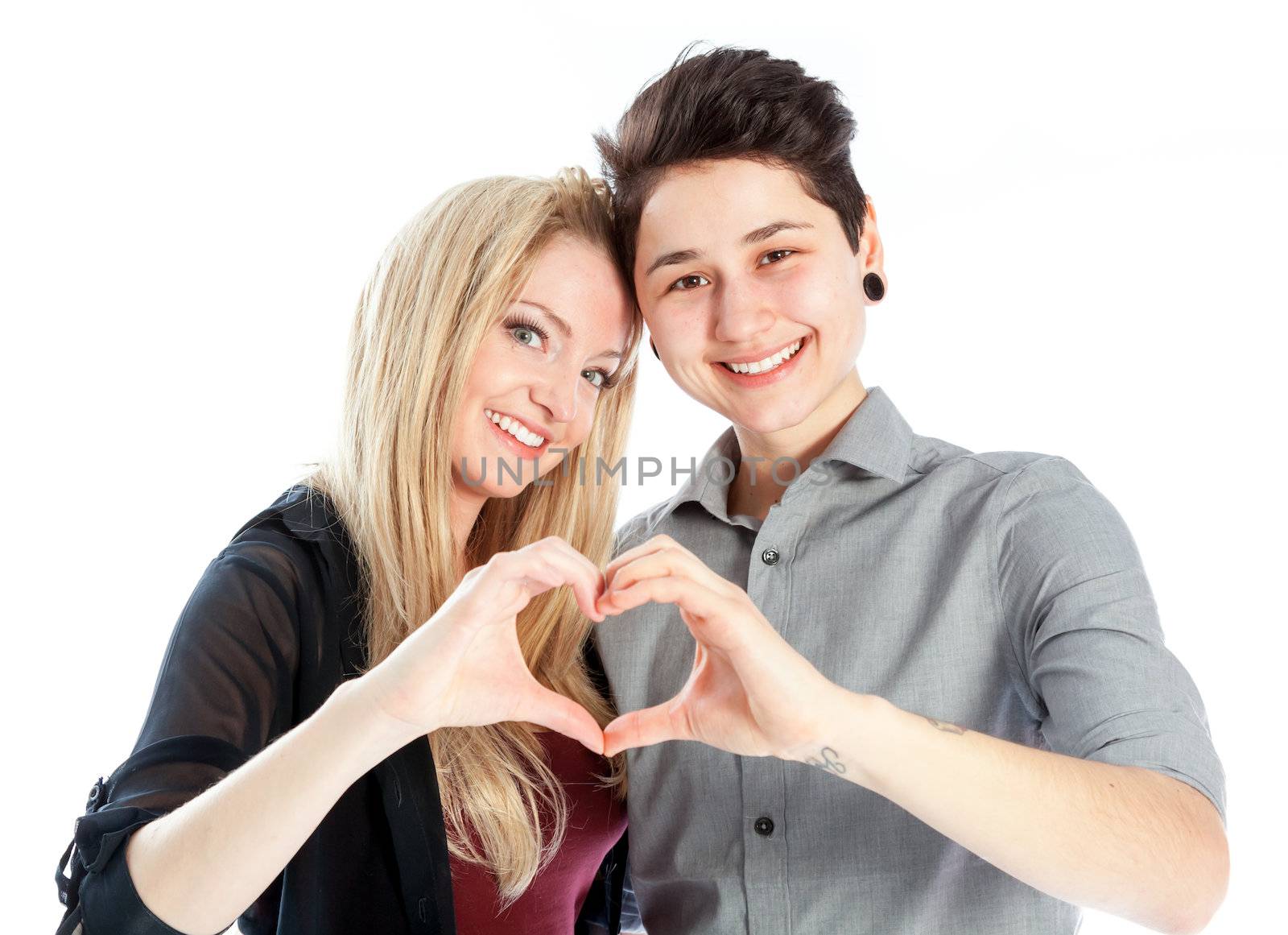 Cute Lesbian couple 30 years old shot in studio isolated on a white background