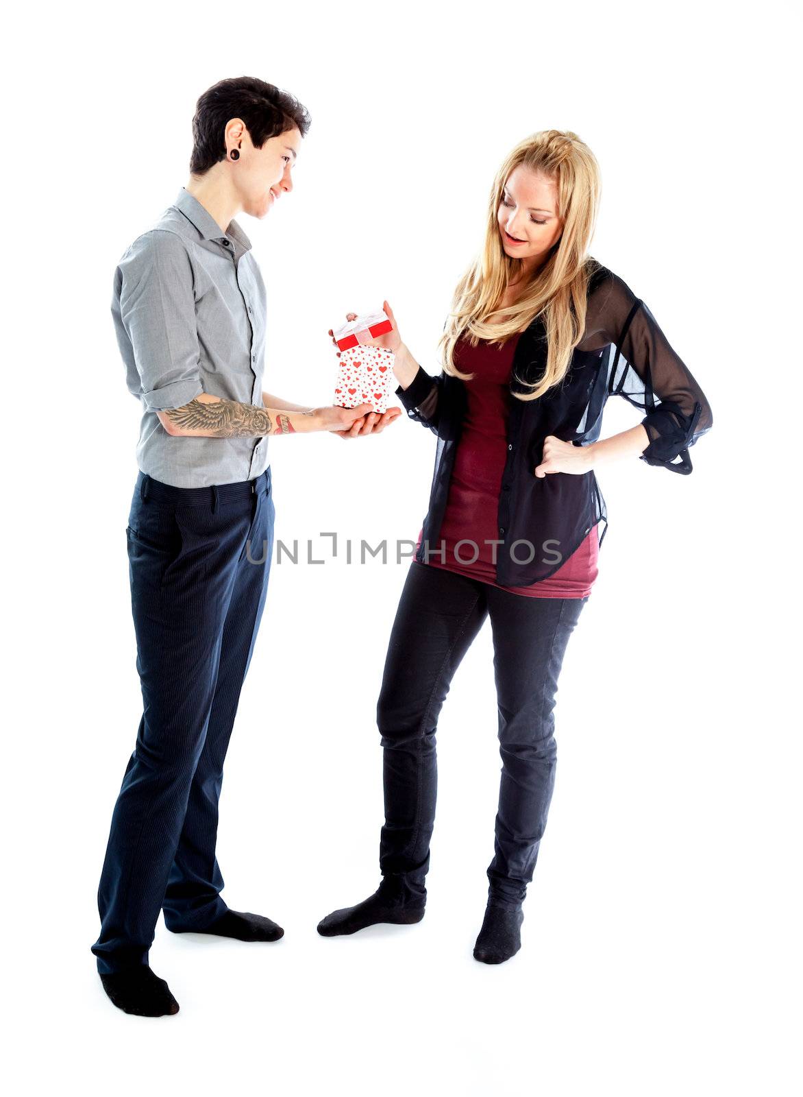 Cute Lesbian couple 30 years old shot in studio isolated on a white background