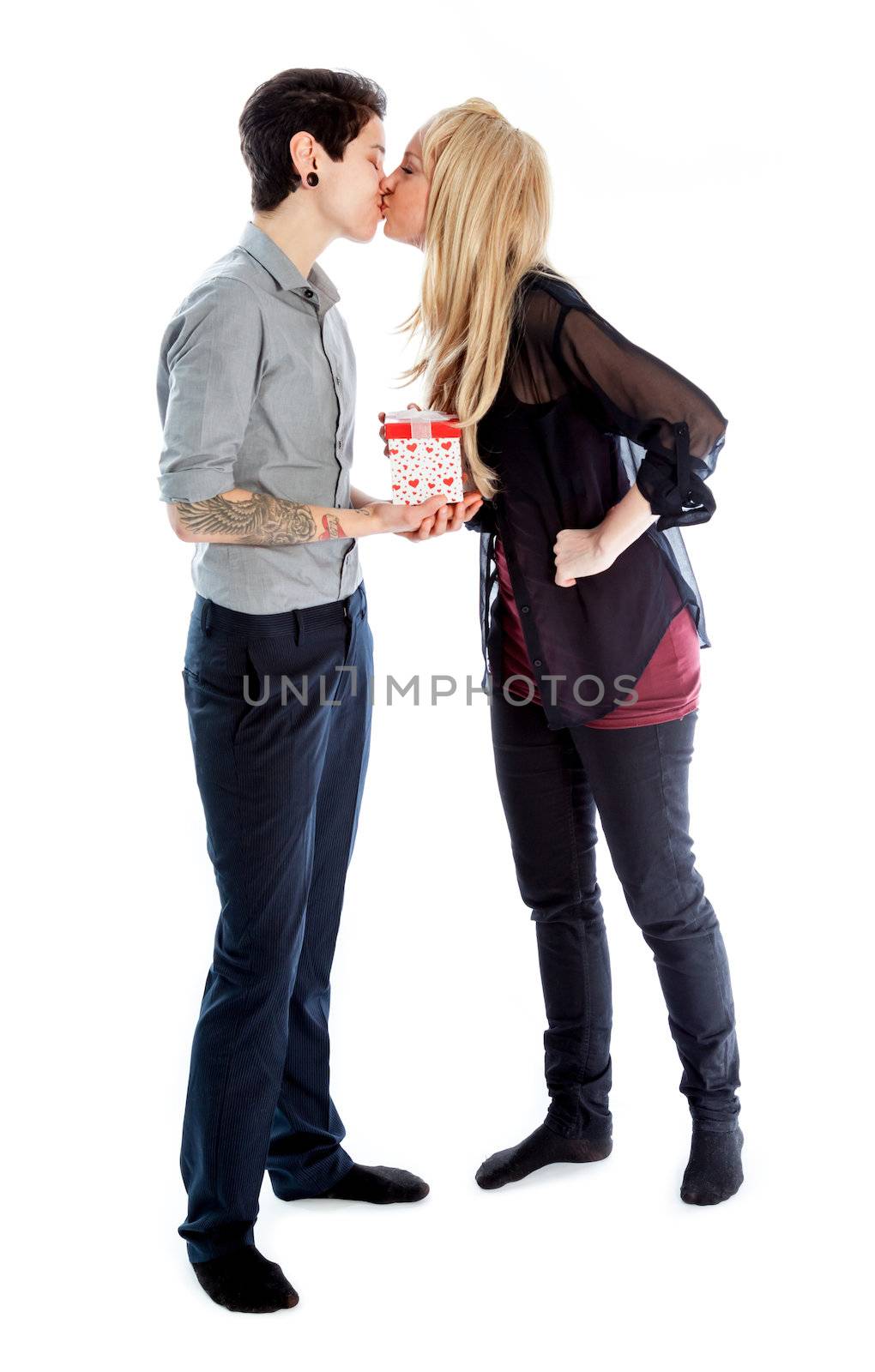 Cute Lesbian couple 30 years old shot in studio isolated on a white background