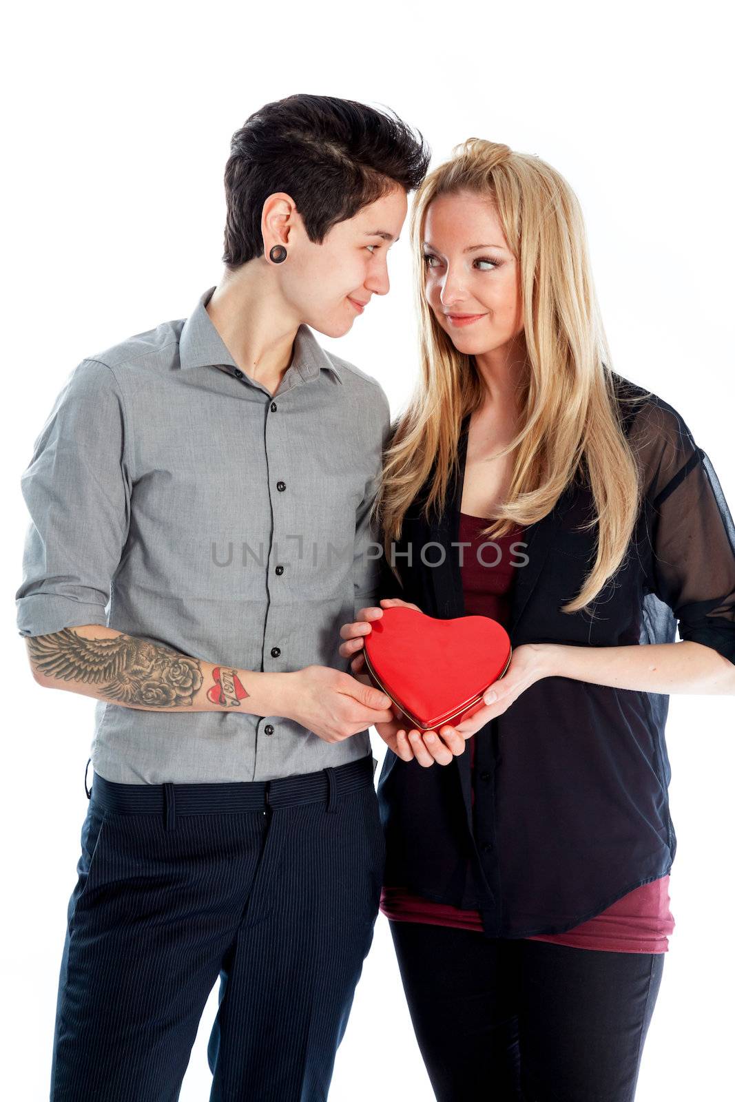 Cute Lesbian couple 30 years old shot in studio isolated on a white background