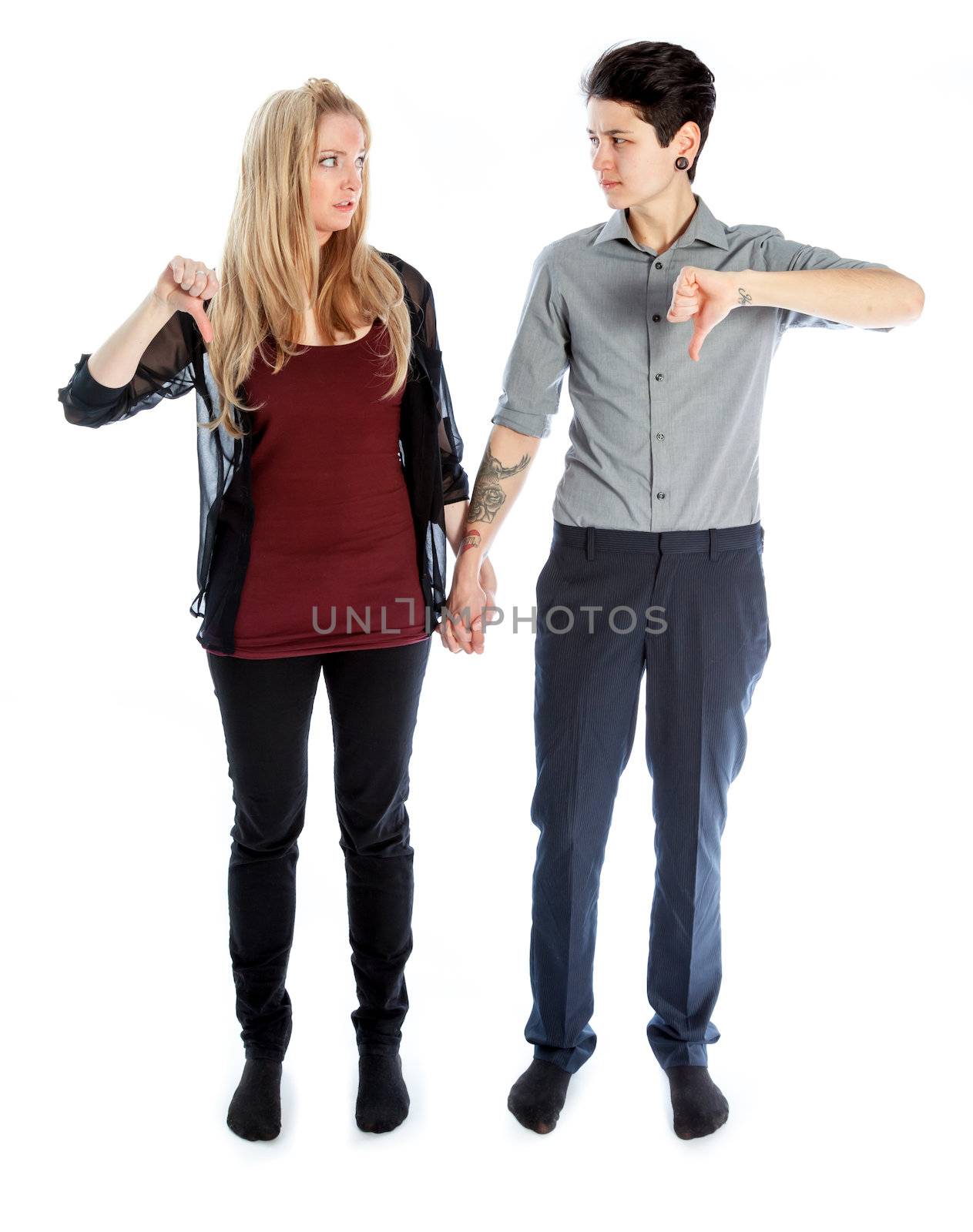 Cute Lesbian couple 30 years old shot in studio isolated on a white background