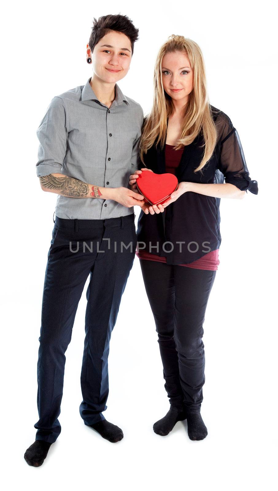 Cute Lesbian couple 30 years old shot in studio isolated on a white background