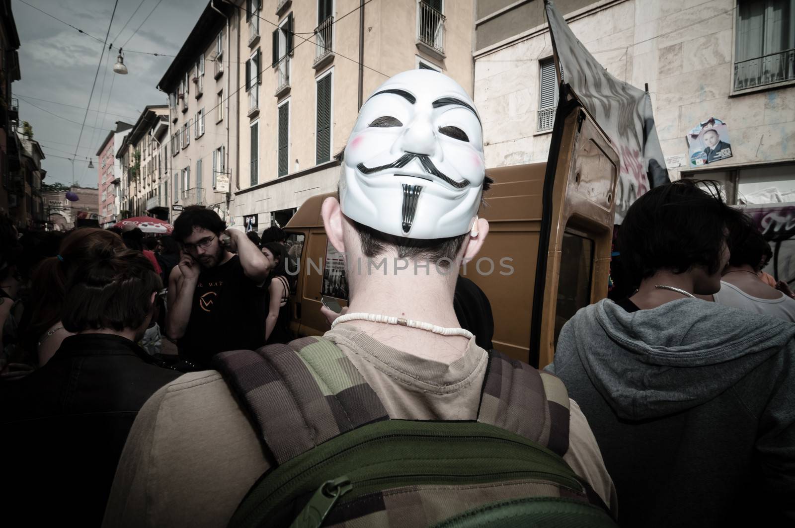 MILAN, ITALY - MAY 1: labor day held in Milan on May 1, 2013. Every year thousands of people taking to the streets to celebrate labor day and to protest against italian austerity