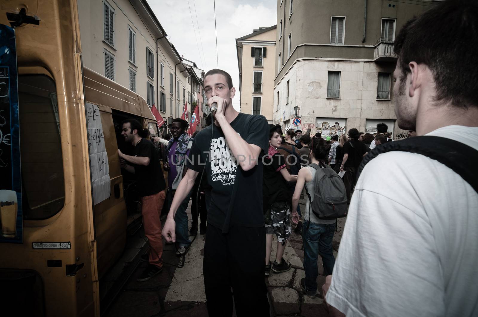 MILAN, ITALY - MAY 1: labor day held in Milan on May 1, 2013. Every year thousands of people taking to the streets to celebrate labor day and to protest against italian austerity