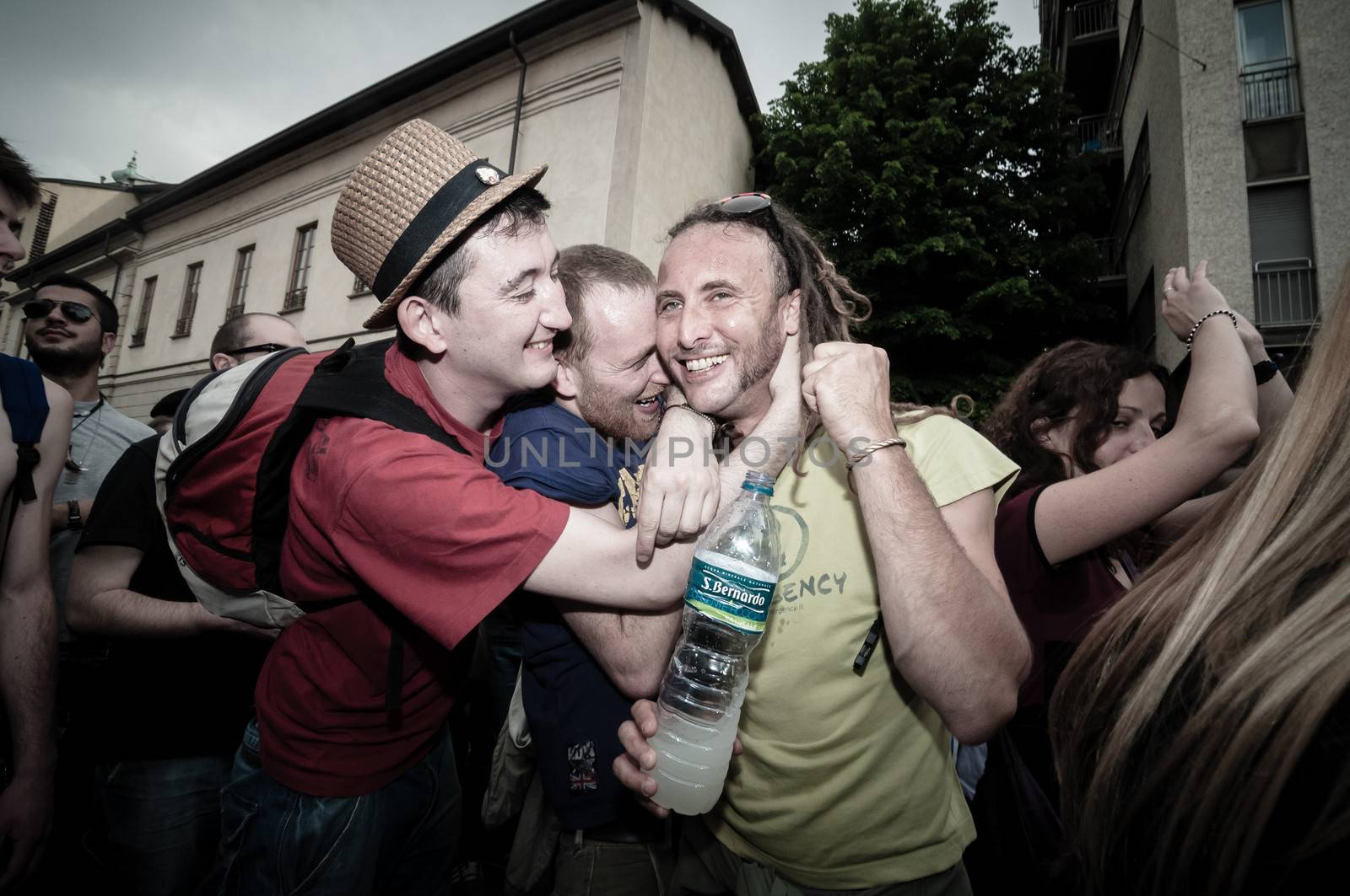 MILAN, ITALY - MAY 1: labor day held in Milan on May 1, 2013. Every year thousands of people taking to the streets to celebrate labor day and to protest against italian austerity