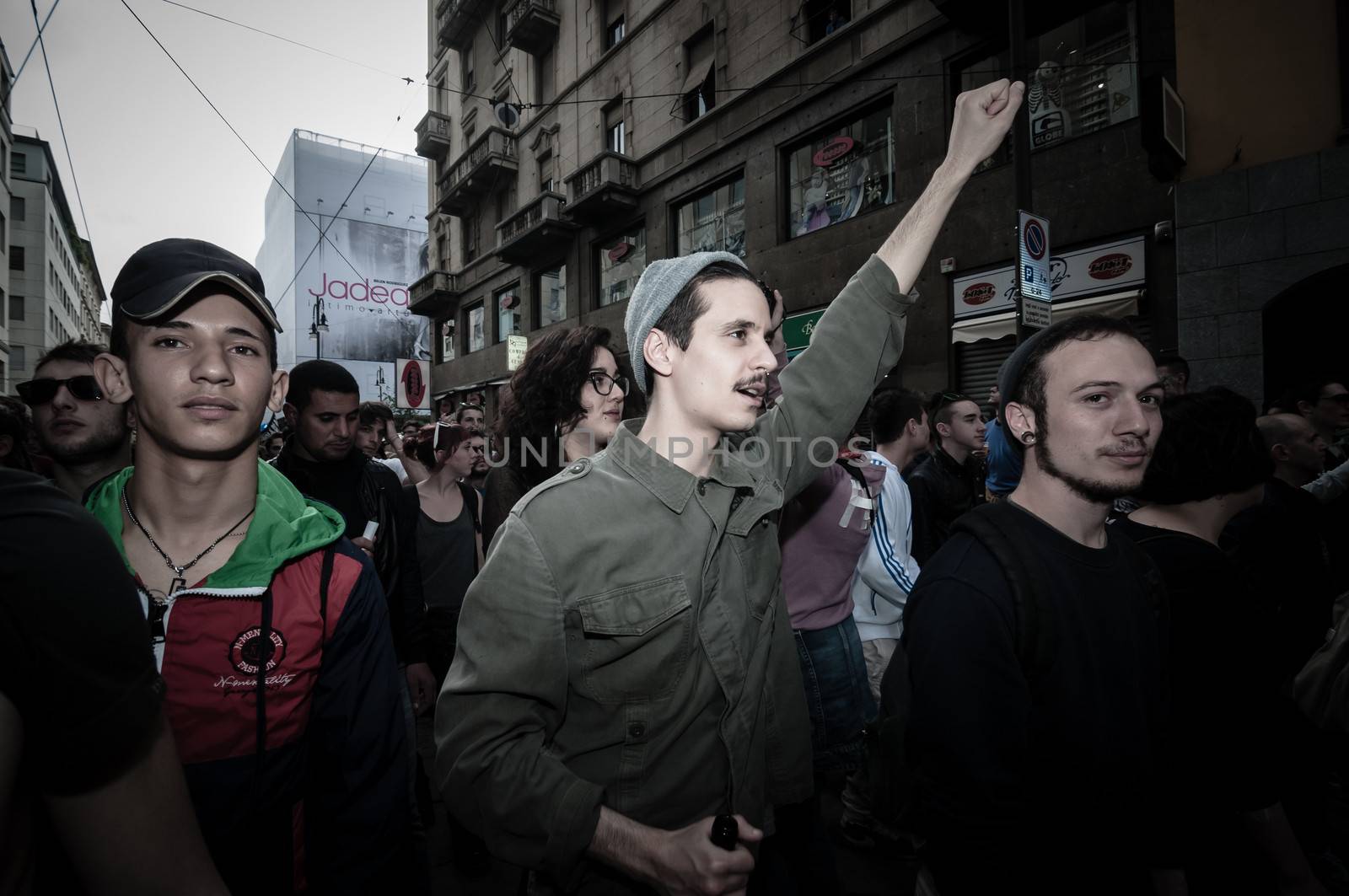 MILAN, ITALY - MAY 1: labor day held in Milan on May 1, 2013. Every year thousands of people taking to the streets to celebrate labor day and to protest against italian austerity