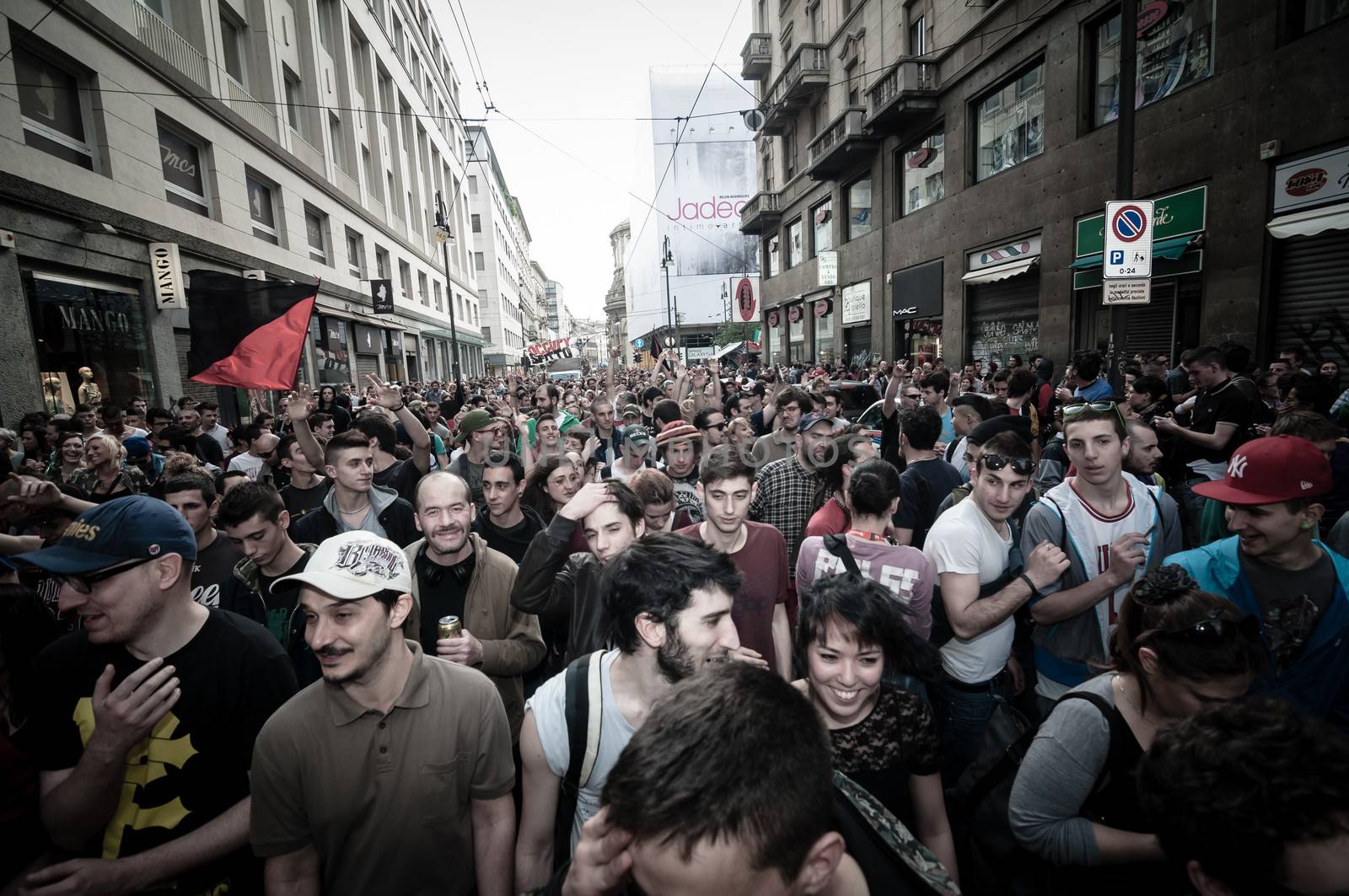 MILAN, ITALY - MAY 1: labor day held in Milan on May 1, 2013. Every year thousands of people taking to the streets to celebrate labor day and to protest against italian austerity