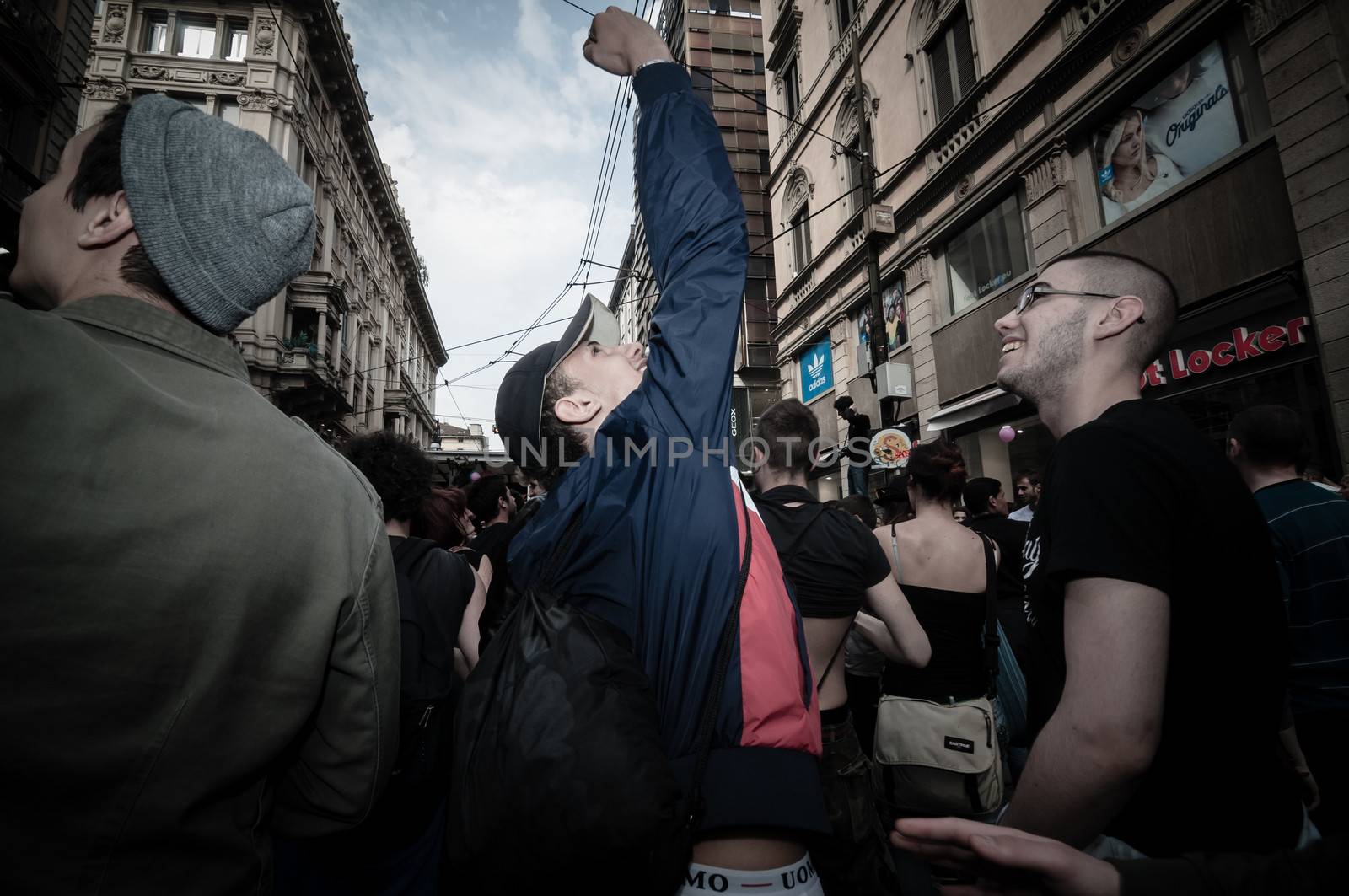 MILAN, ITALY - MAY 1: labor day held in Milan on May 1, 2013. Every year thousands of people taking to the streets to celebrate labor day and to protest against italian austerity