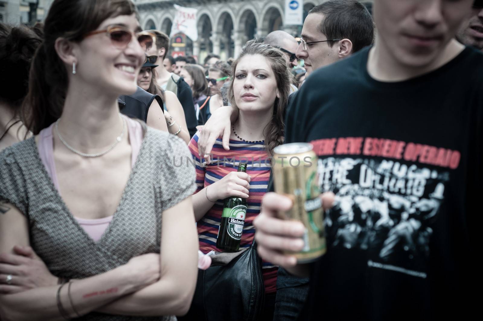 MILAN, ITALY - MAY 1: labor day held in Milan on May 1, 2013. Every year thousands of people taking to the streets to celebrate labor day and to protest against italian austerity