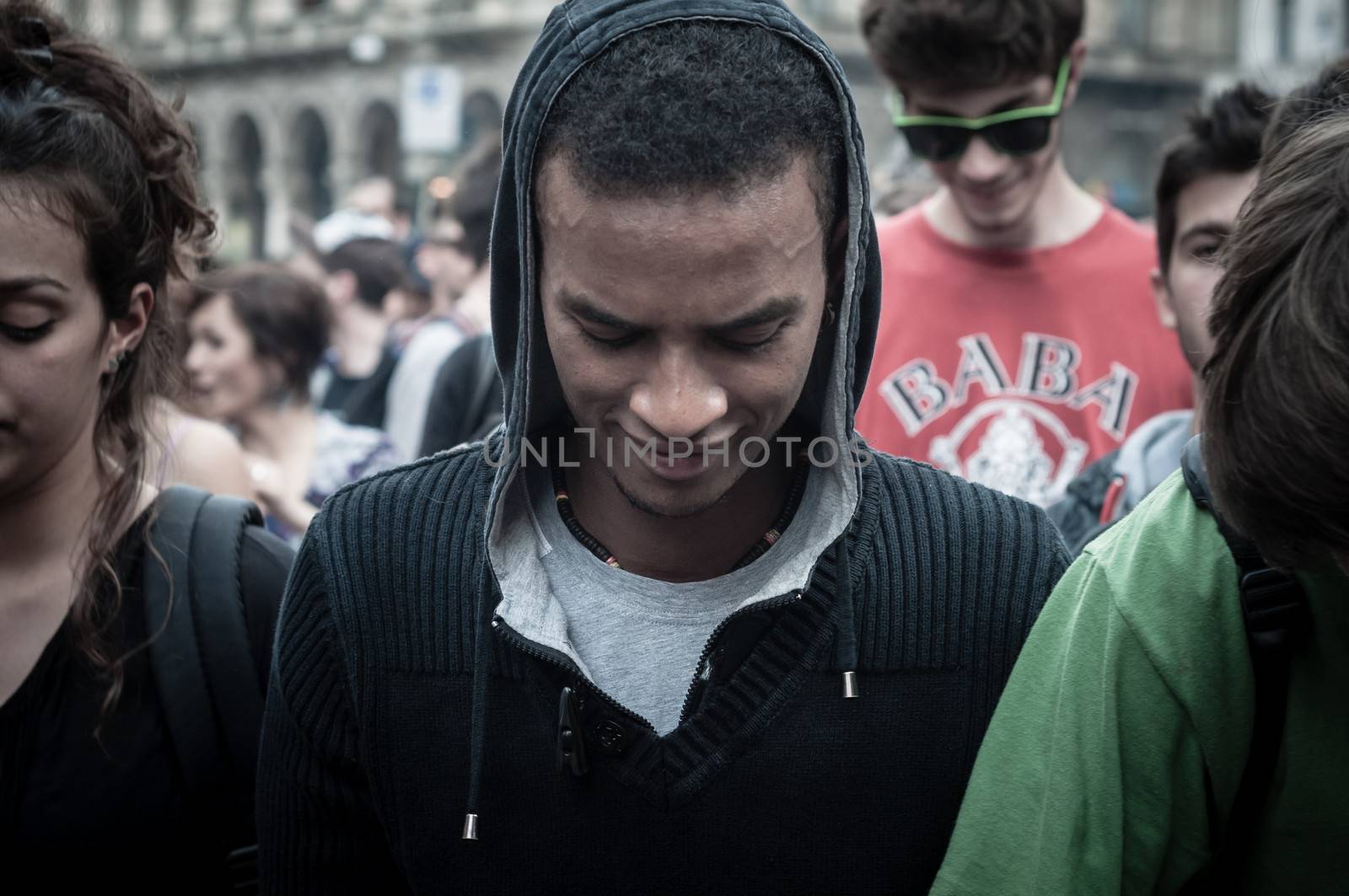 MILAN, ITALY - MAY 1: labor day held in Milan on May 1, 2013. Every year thousands of people taking to the streets to celebrate labor day and to protest against italian austerity