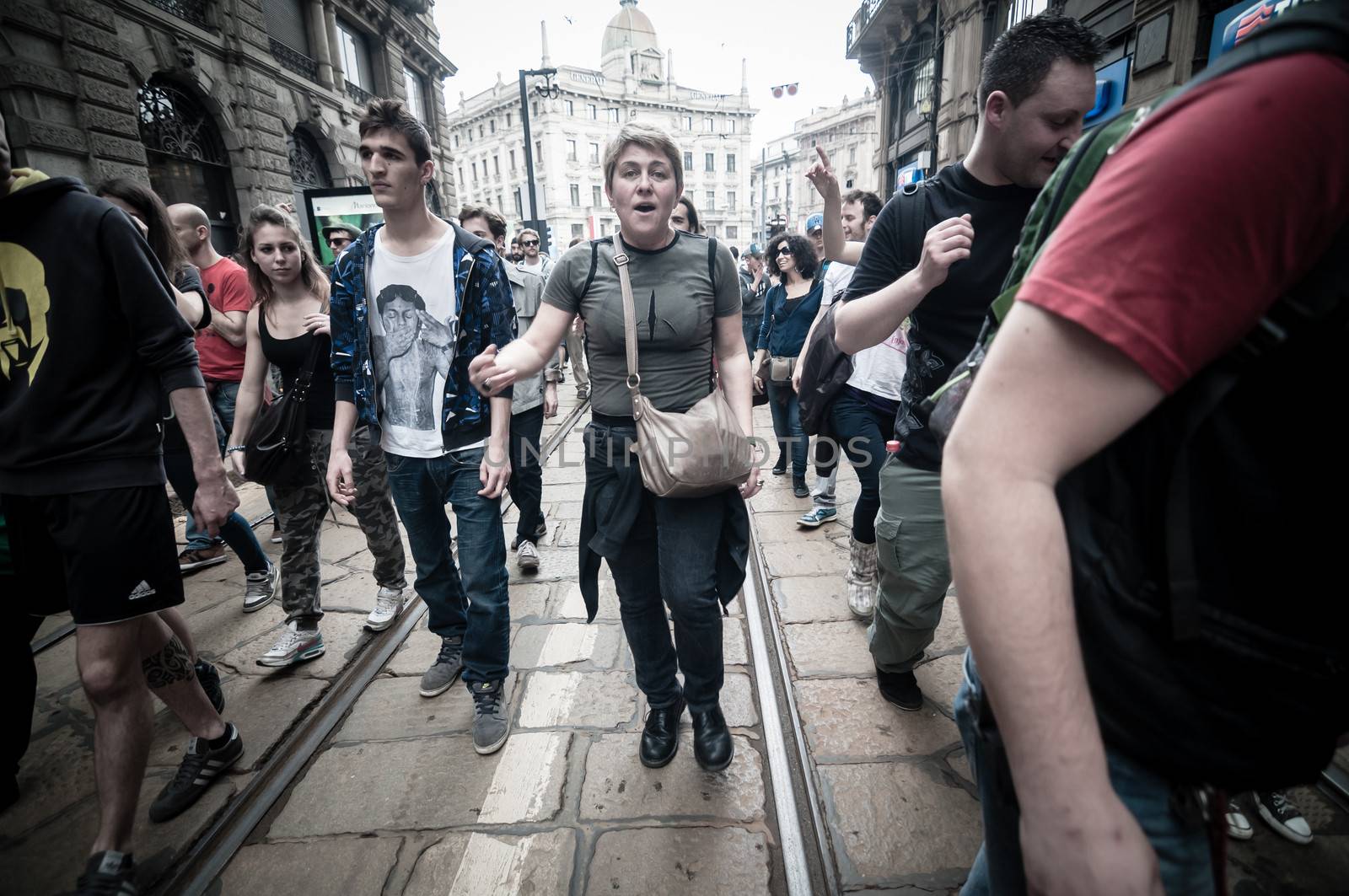 MILAN, ITALY - MAY 1: labor day held in Milan on May 1, 2013. Every year thousands of people taking to the streets to celebrate labor day and to protest against italian austerity