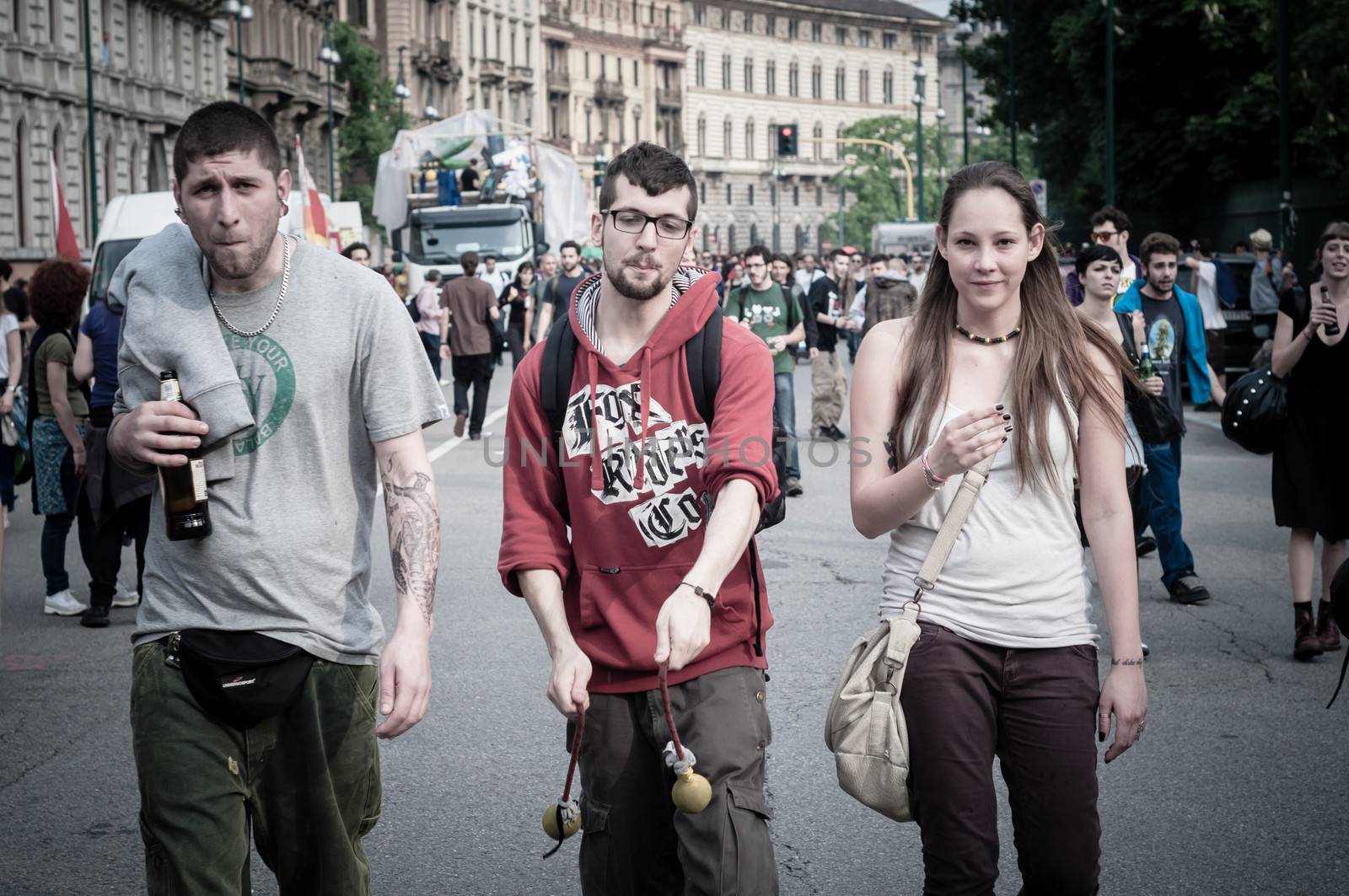 MILAN, ITALY - MAY 1: labor day held in Milan on May 1, 2013. Every year thousands of people taking to the streets to celebrate labor day and to protest against italian austerity