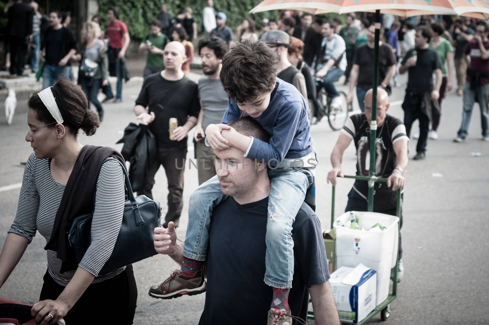 MILAN, ITALY - MAY 1: labor day held in Milan on May 1, 2013. Every year thousands of people taking to the streets to celebrate labor day and to protest against italian austerity