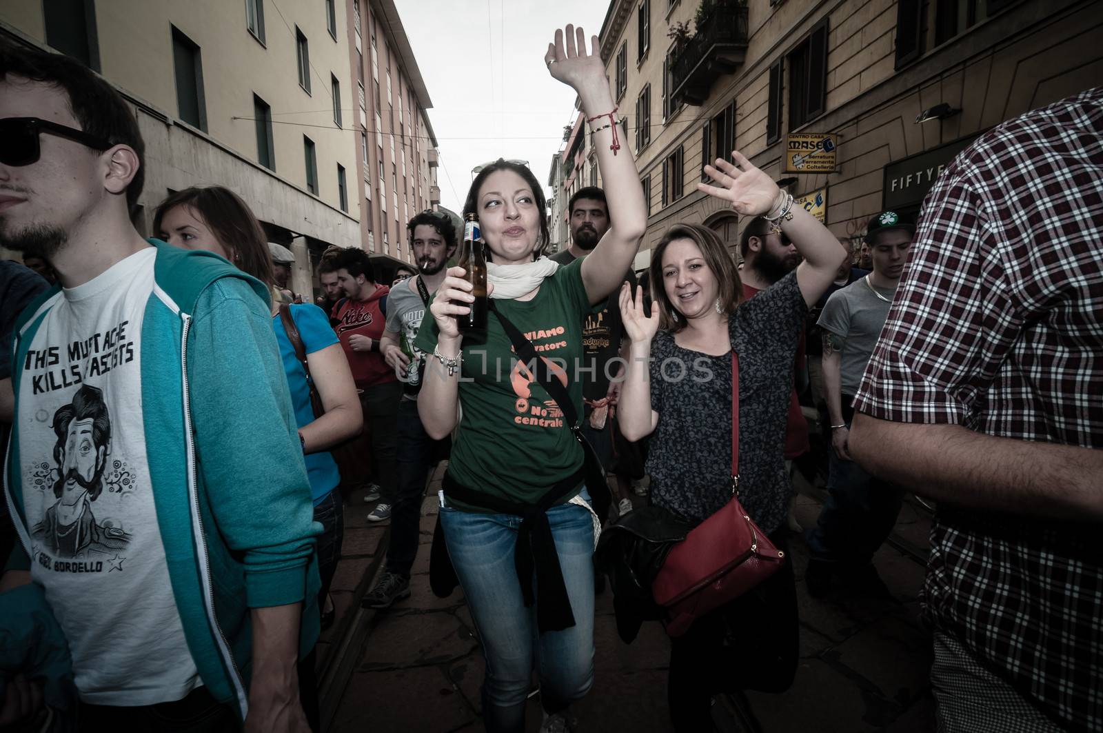 MILAN, ITALY - MAY 1: labor day held in Milan on May 1, 2013. Every year thousands of people taking to the streets to celebrate labor day and to protest against italian austerity