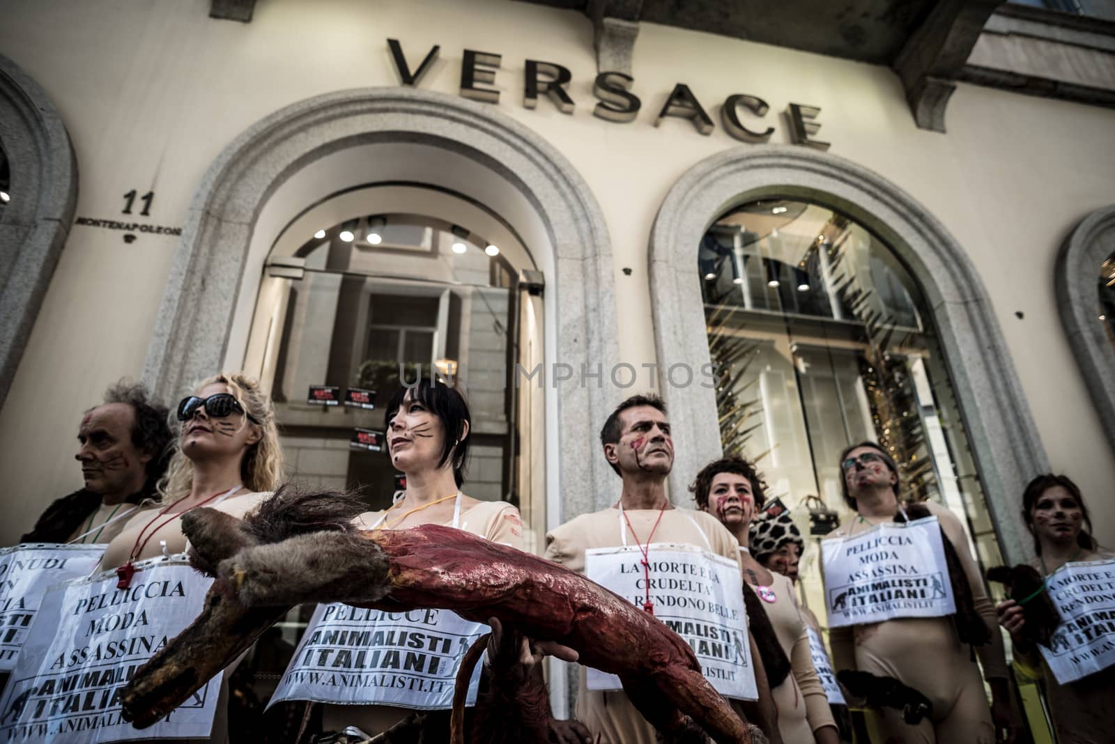 MILAN, ITALY - SEPTEMBER 17: Animalisti Italiani protest on September 17, 2013. Animal right association 'Animalisti Italiani' protest against furs and fashion, in famous fashion Milan street Monte Napoleone