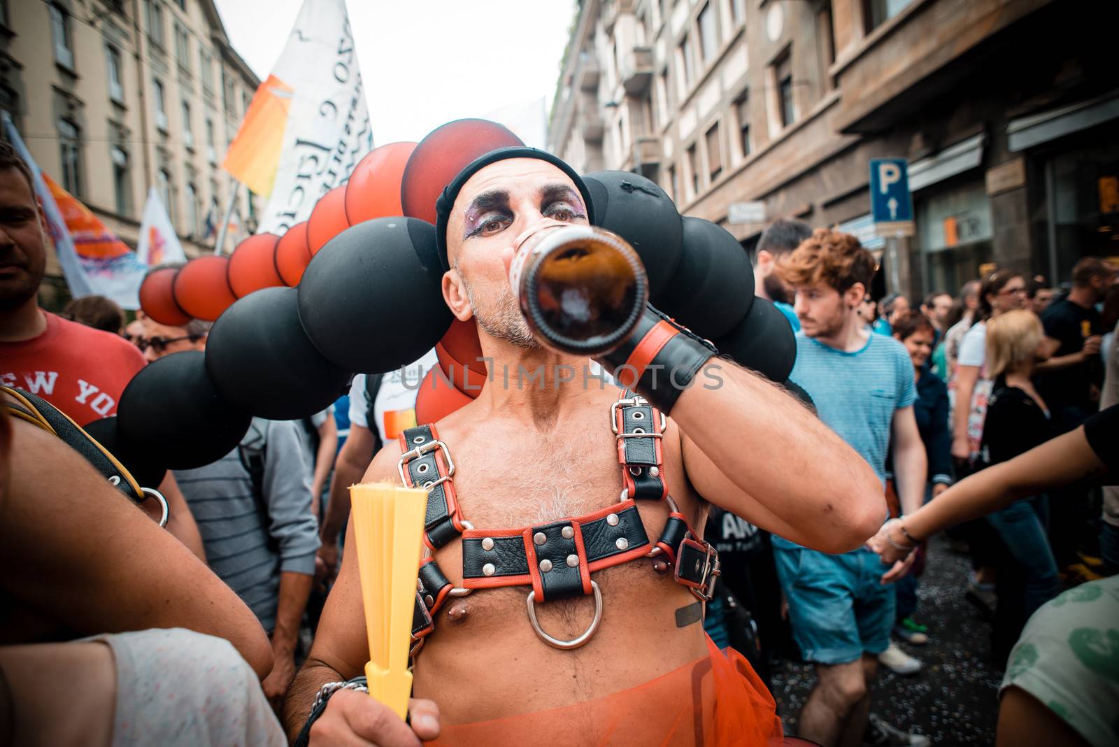 MILAN, ITALY - JUNE 29: gay pride manifestation in Milan June 29, 2013. Normal people, gay, lesbians, transgenders and bisexuals take to the street for their rights organizing a street parade party