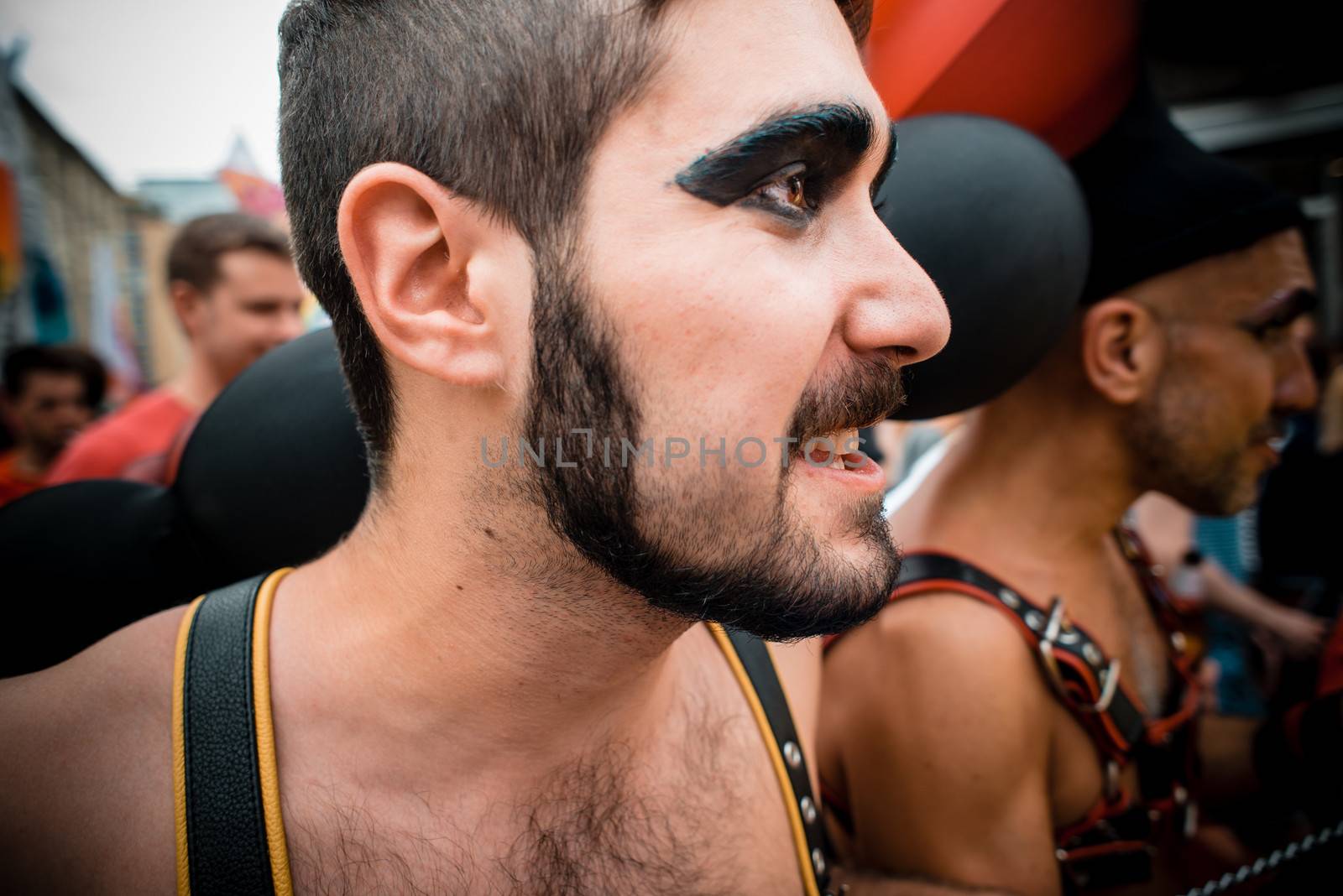 MILAN, ITALY - JUNE 29: gay pride manifestation in Milan June 29, 2013. Normal people, gay, lesbians, transgenders and bisexuals take to the street for their rights organizing a street parade party