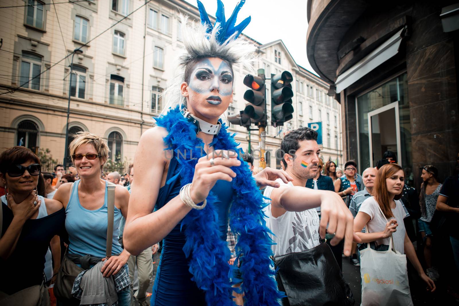 MILAN, ITALY - JUNE 29: gay pride manifestation in Milan June 29, 2013. Normal people, gay, lesbians, transgenders and bisexuals take to the street for their rights organizing a street parade party