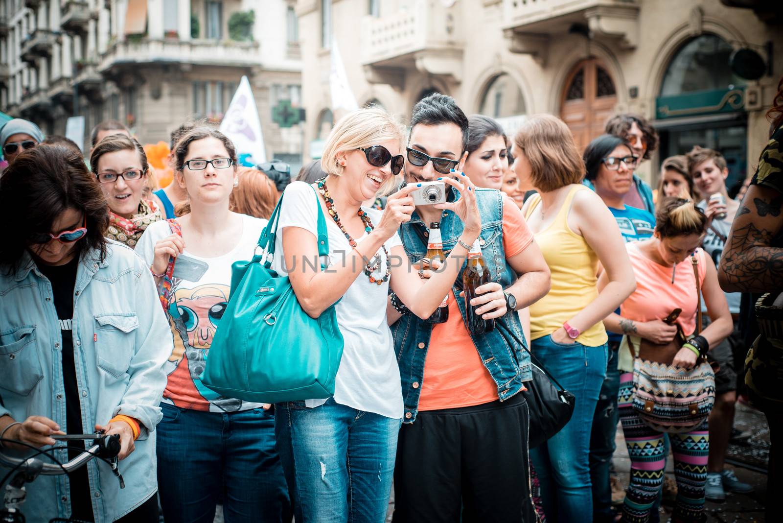 MILAN, ITALY - JUNE 29: gay pride manifestation in Milan June 29, 2013. Normal people, gay, lesbians, transgenders and bisexuals take to the street for their rights organizing a street parade party