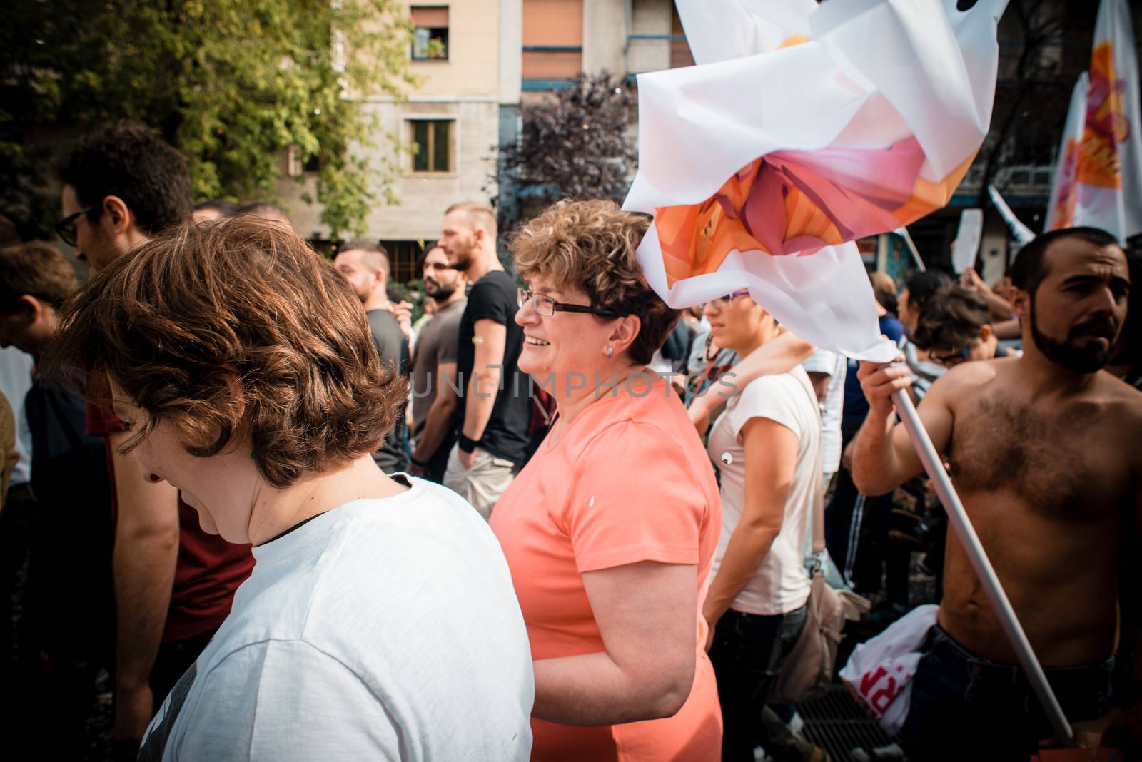 MILAN, ITALY - JUNE 29: gay pride manifestation in Milan June 29, 2013. Normal people, gay, lesbians, transgenders and bisexuals take to the street for their rights organizing a street parade party