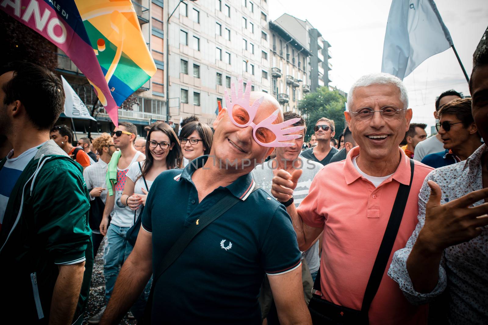 MILAN, ITALY - JUNE 29: gay pride manifestation in Milan June 29, 2013. Normal people, gay, lesbians, transgenders and bisexuals take to the street for their rights organizing a street parade party