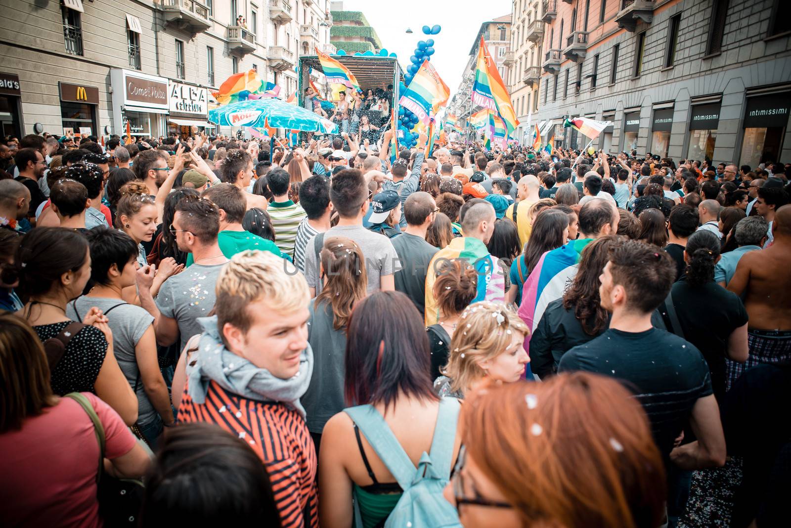 MILAN, ITALY - JUNE 29: gay pride manifestation in Milan June 29, 2013. Normal people, gay, lesbians, transgenders and bisexuals take to the street for their rights organizing a street parade party