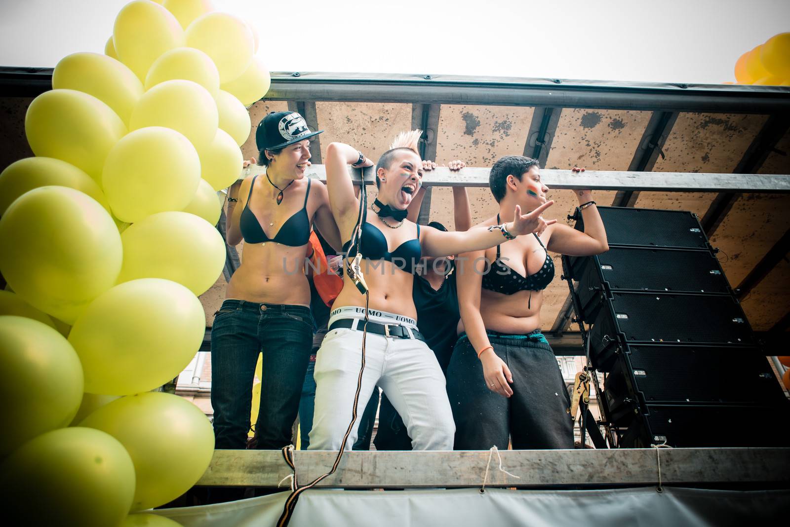 MILAN, ITALY - JUNE 29: gay pride manifestation in Milan June 29, 2013. Normal people, gay, lesbians, transgenders and bisexuals take to the street for their rights organizing a street parade party