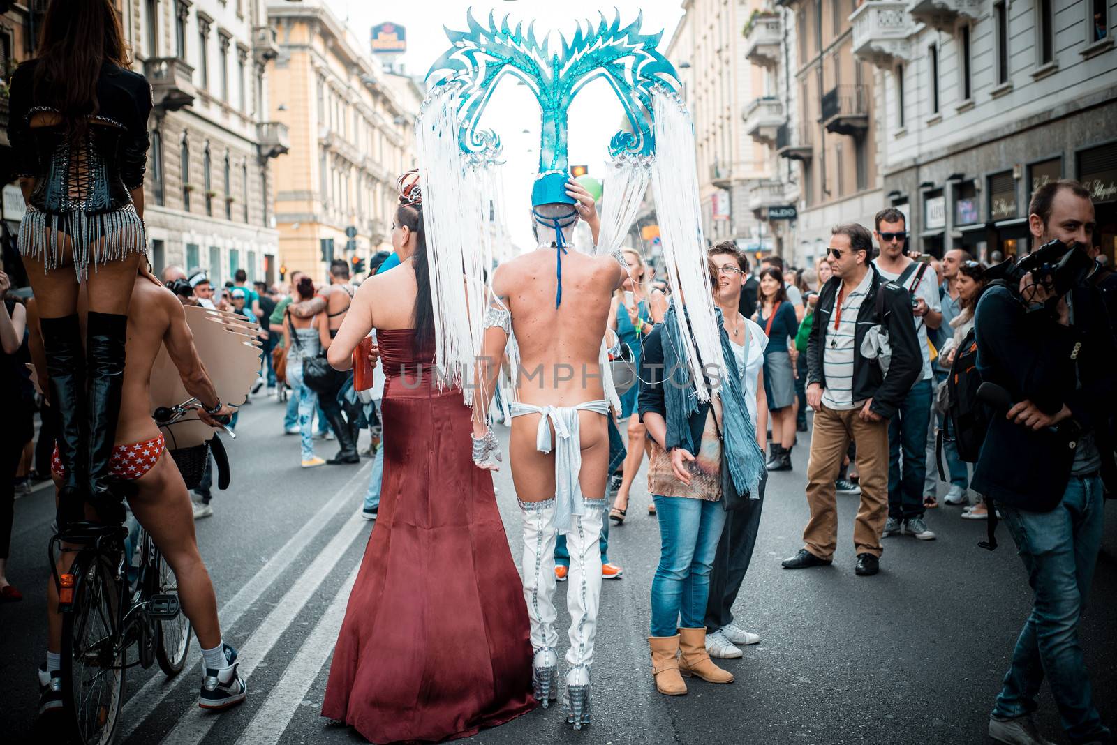 MILAN, ITALY - JUNE 29: gay pride manifestation in Milan June 29, 2013. Normal people, gay, lesbians, transgenders and bisexuals take to the street for their rights organizing a street parade party