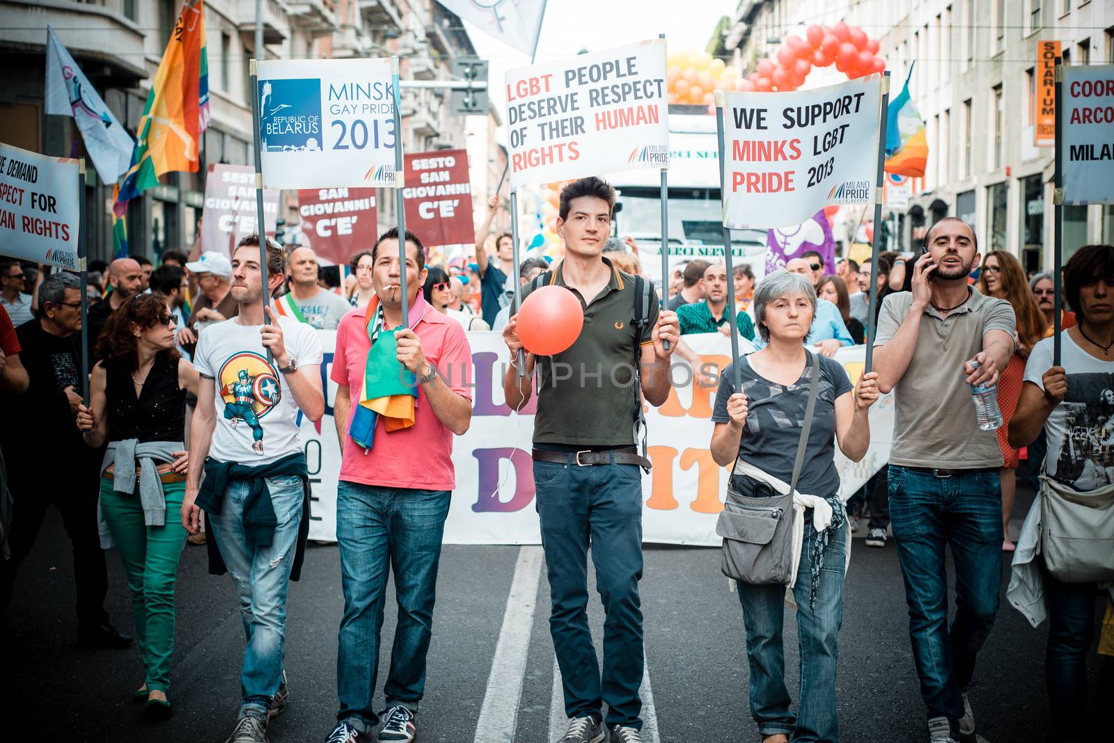 MILAN, ITALY - JUNE 29: gay pride manifestation in Milan June 29, 2013. Normal people, gay, lesbians, transgenders and bisexuals take to the street for their rights organizing a street parade party