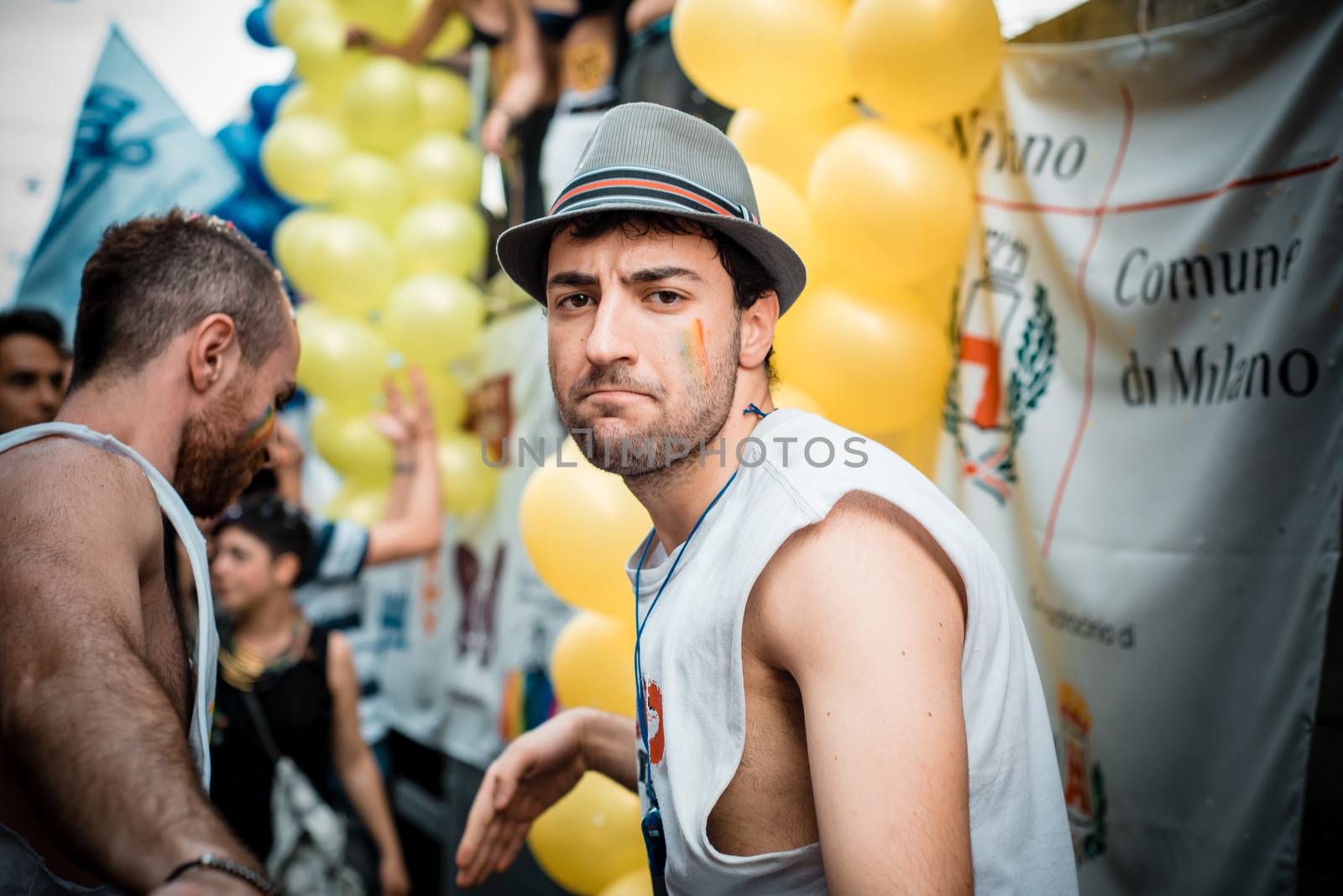 MILAN, ITALY - JUNE 29: gay pride manifestation in Milan June 29, 2013. Normal people, gay, lesbians, transgenders and bisexuals take to the street for their rights organizing a street parade party