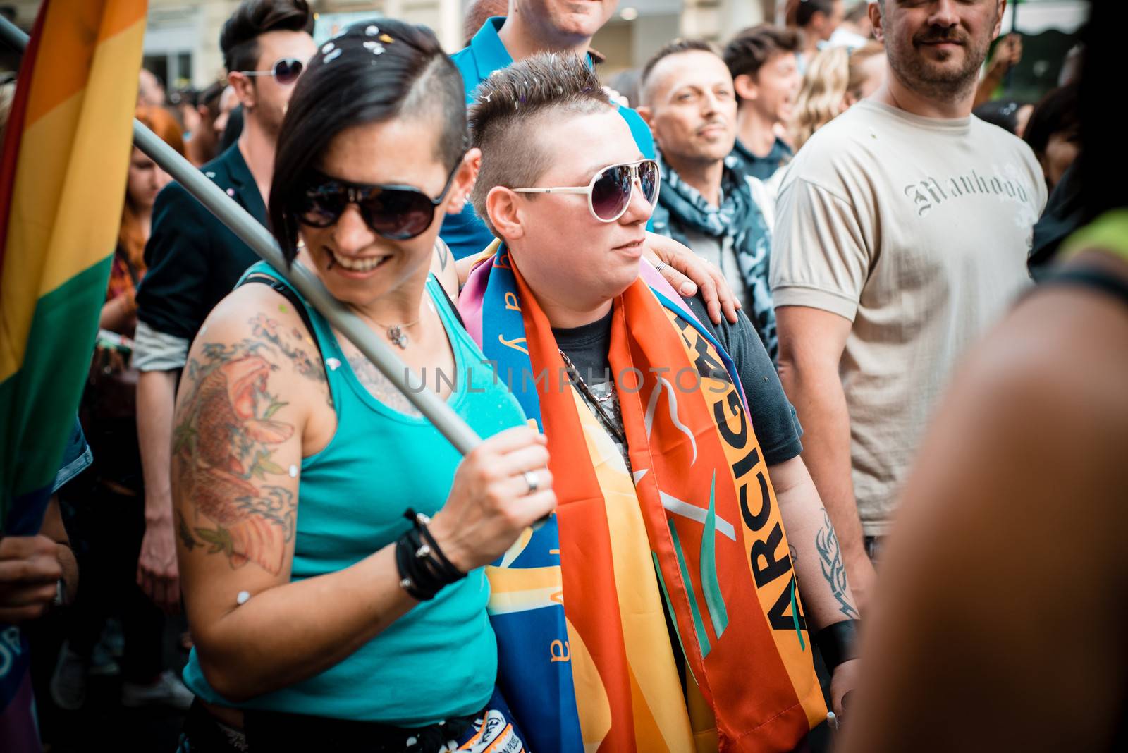 MILAN, ITALY - JUNE 29: gay pride manifestation in Milan June 29, 2013. Normal people, gay, lesbians, transgenders and bisexuals take to the street for their rights organizing a street parade party