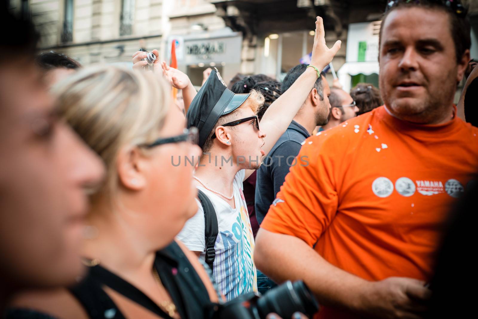 MILAN, ITALY - JUNE 29: gay pride manifestation in Milan June 29, 2013. Normal people, gay, lesbians, transgenders and bisexuals take to the street for their rights organizing a street parade party