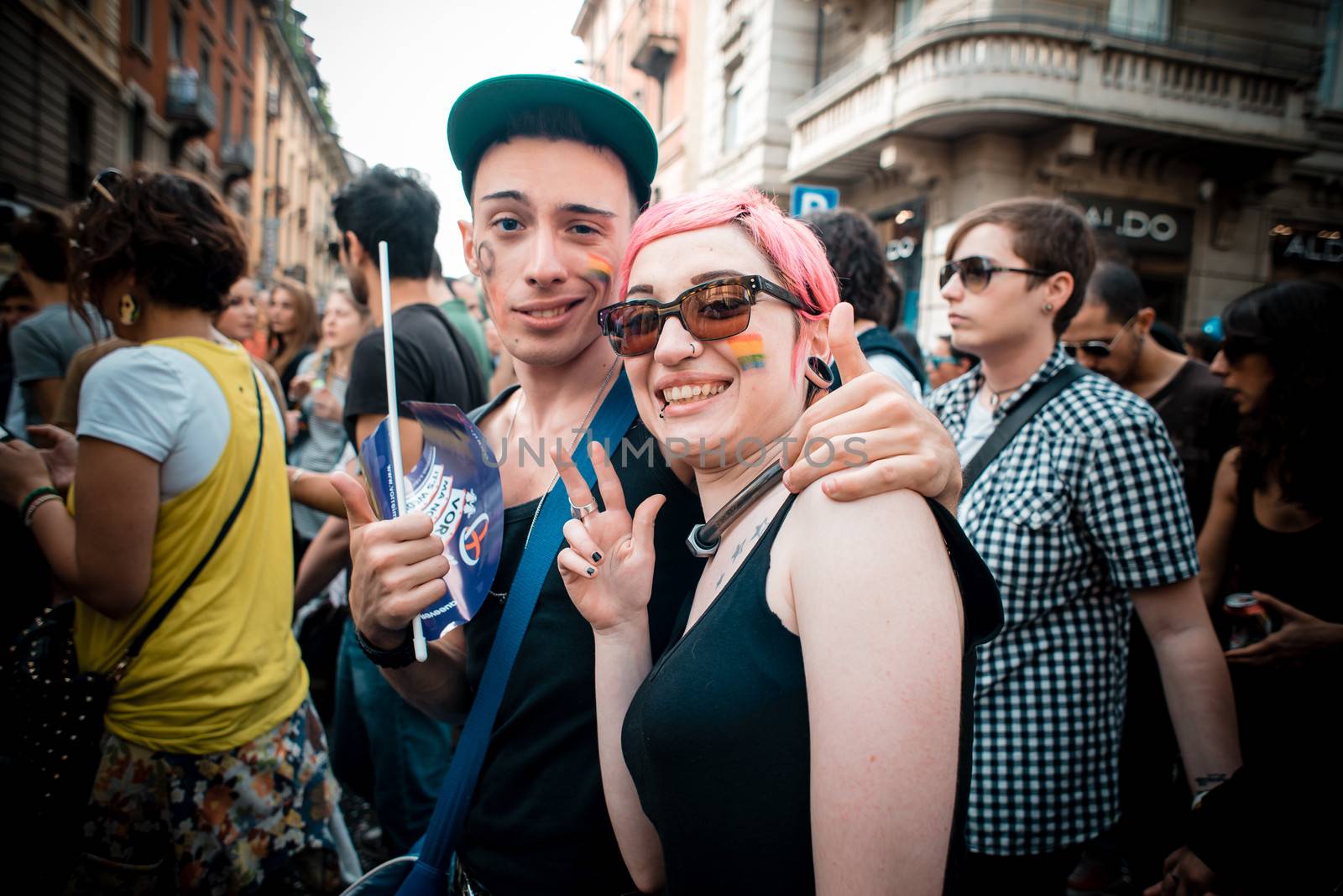 MILAN, ITALY - JUNE 29: gay pride manifestation in Milan June 29, 2013. Normal people, gay, lesbians, transgenders and bisexuals take to the street for their rights organizing a street parade party