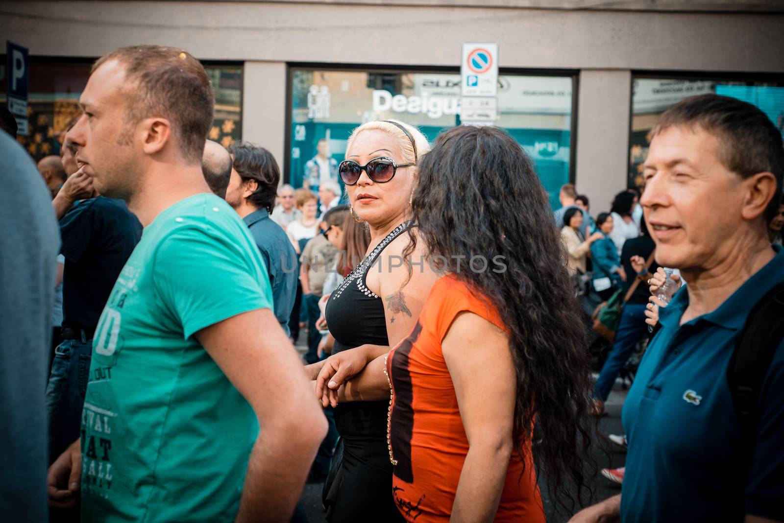 MILAN, ITALY - JUNE 29: gay pride manifestation in Milan June 29, 2013. Normal people, gay, lesbians, transgenders and bisexuals take to the street for their rights organizing a street parade party