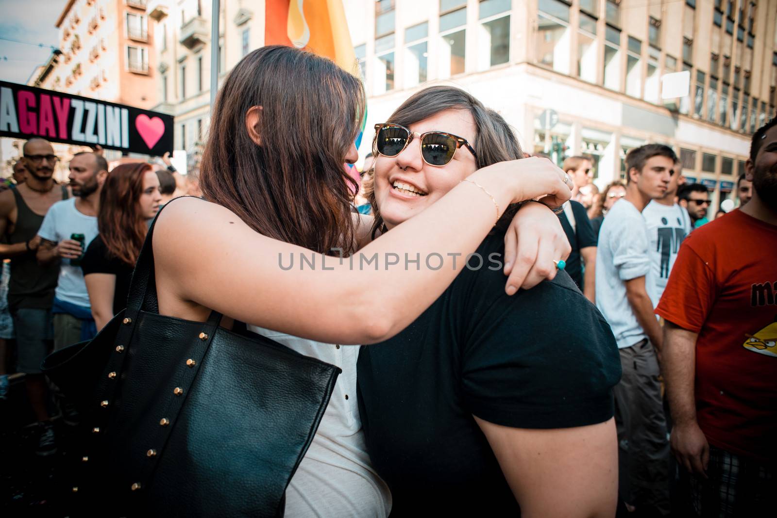 MILAN, ITALY - JUNE 29: gay pride manifestation in Milan June 29, 2013. Normal people, gay, lesbians, transgenders and bisexuals take to the street for their rights organizing a street parade party