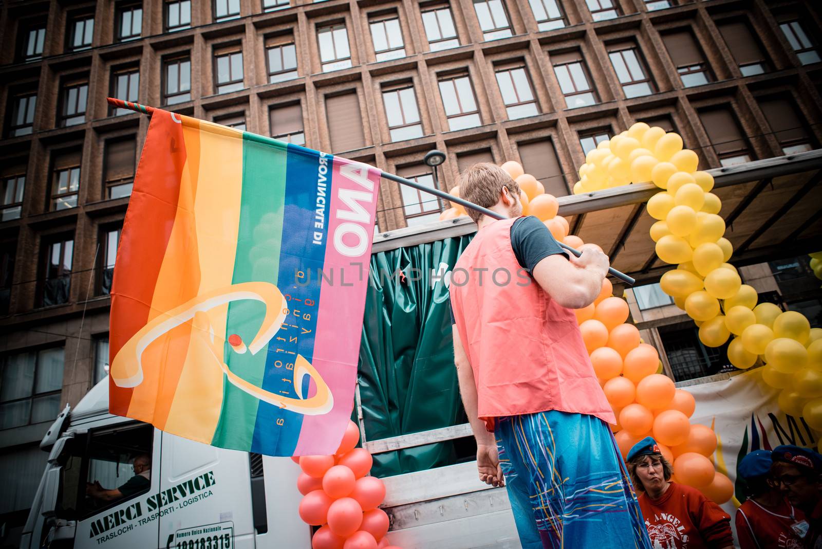 MILAN, ITALY - JUNE 29: gay pride manifestation in Milan June 29, 2013. Normal people, gay, lesbians, transgenders and bisexuals take to the street for their rights organizing a street parade party