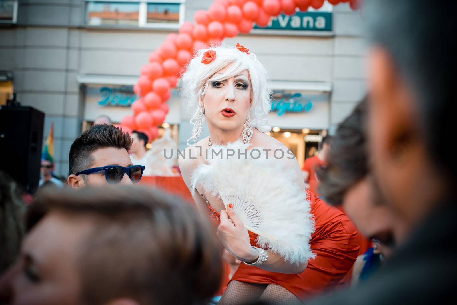 MILAN, ITALY - JUNE 29: gay pride manifestation in Milan June 29, 2013. Normal people, gay, lesbians, transgenders and bisexuals take to the street for their rights organizing a street parade party