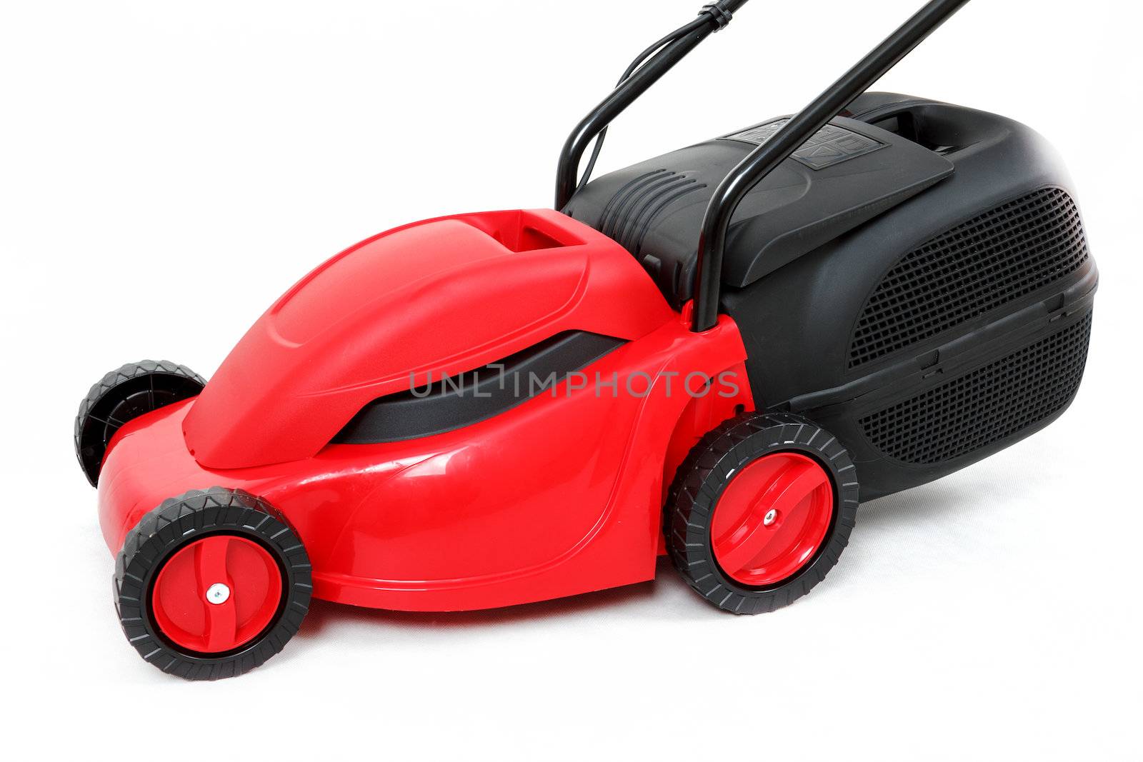 new red lawnmower isolated on white, studio shoot