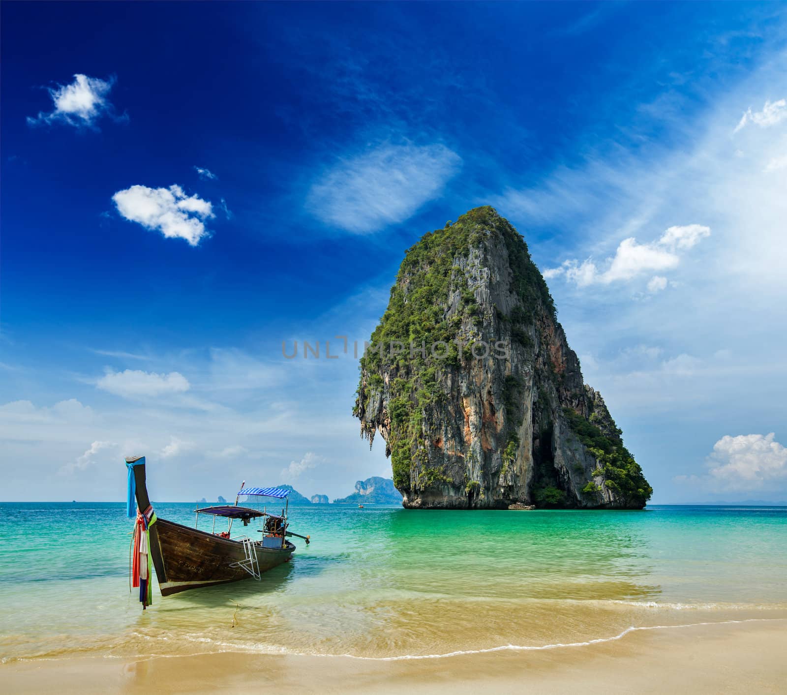 Tropical vacation holiday beach concept - Long tail boat on tropical beach, Krabi, Thailand