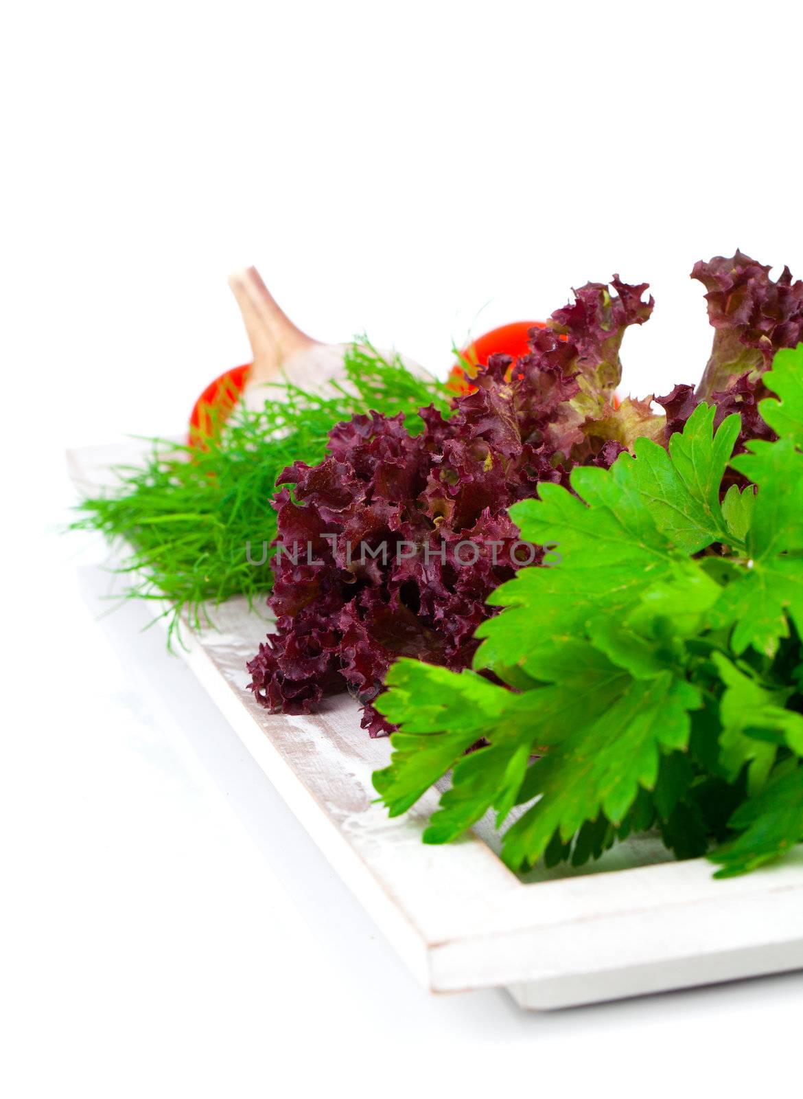 green herbs in braided basket isolated on white background by motorolka