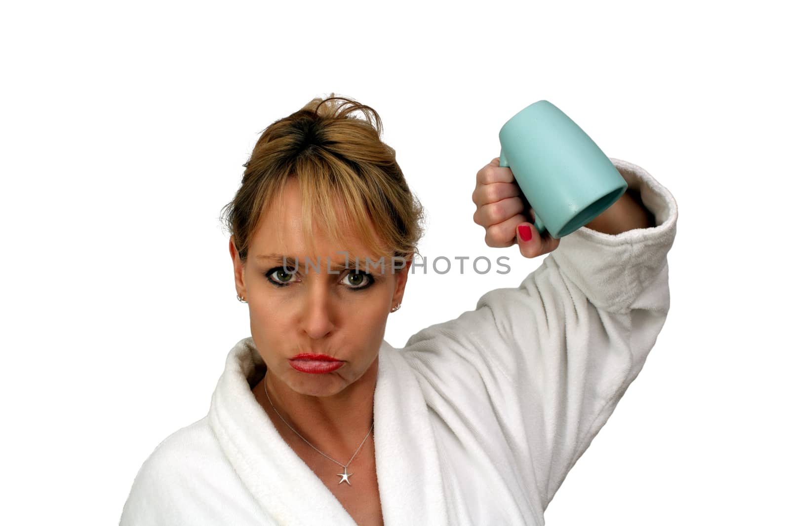 A lovely blonde turns her coffee cup upside-down with a disappointed or frustrated facial expression.  Isolated on a white background.