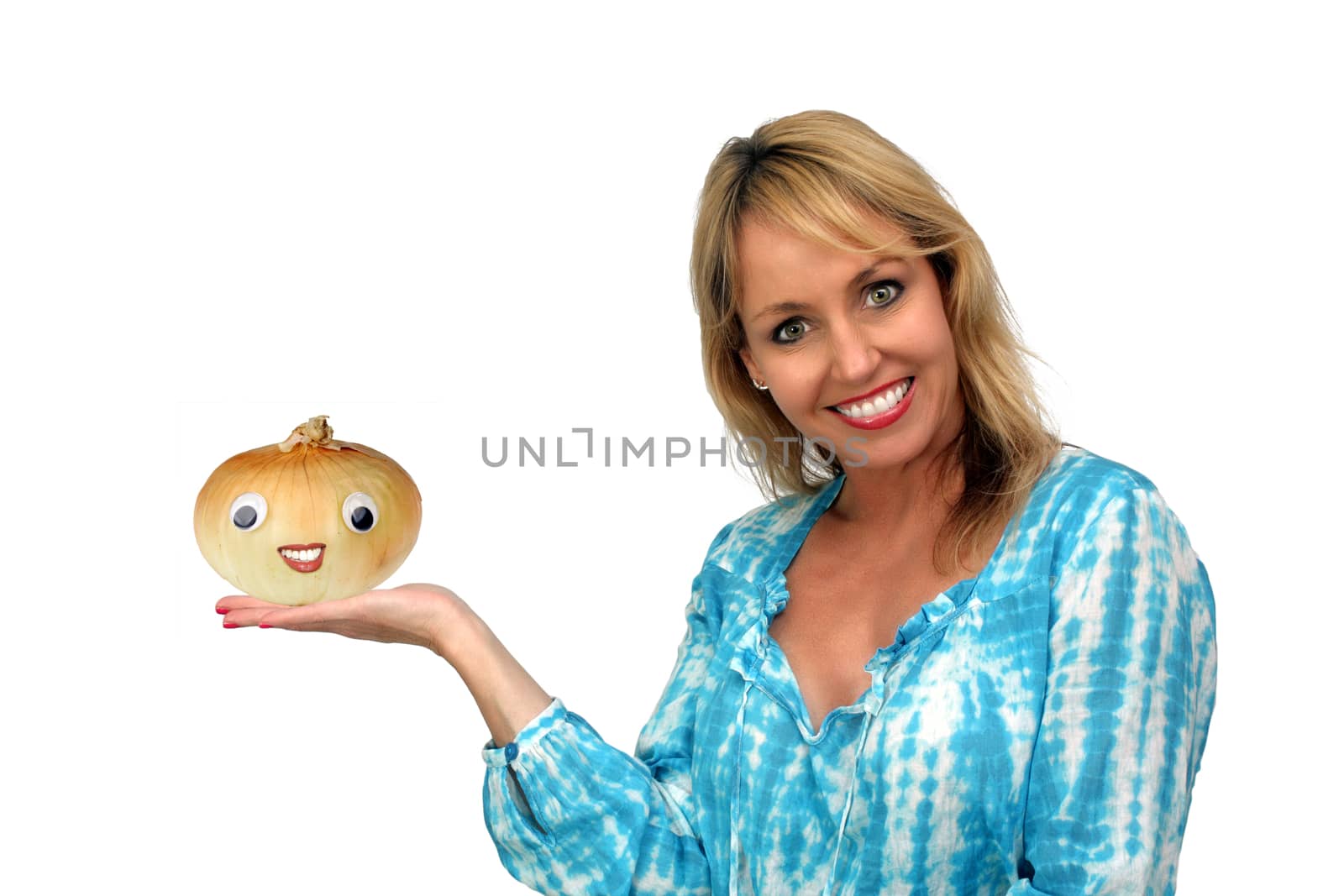 A lovely blonde holds a smiling anthropomorphic onion.  Isolated on a white background.