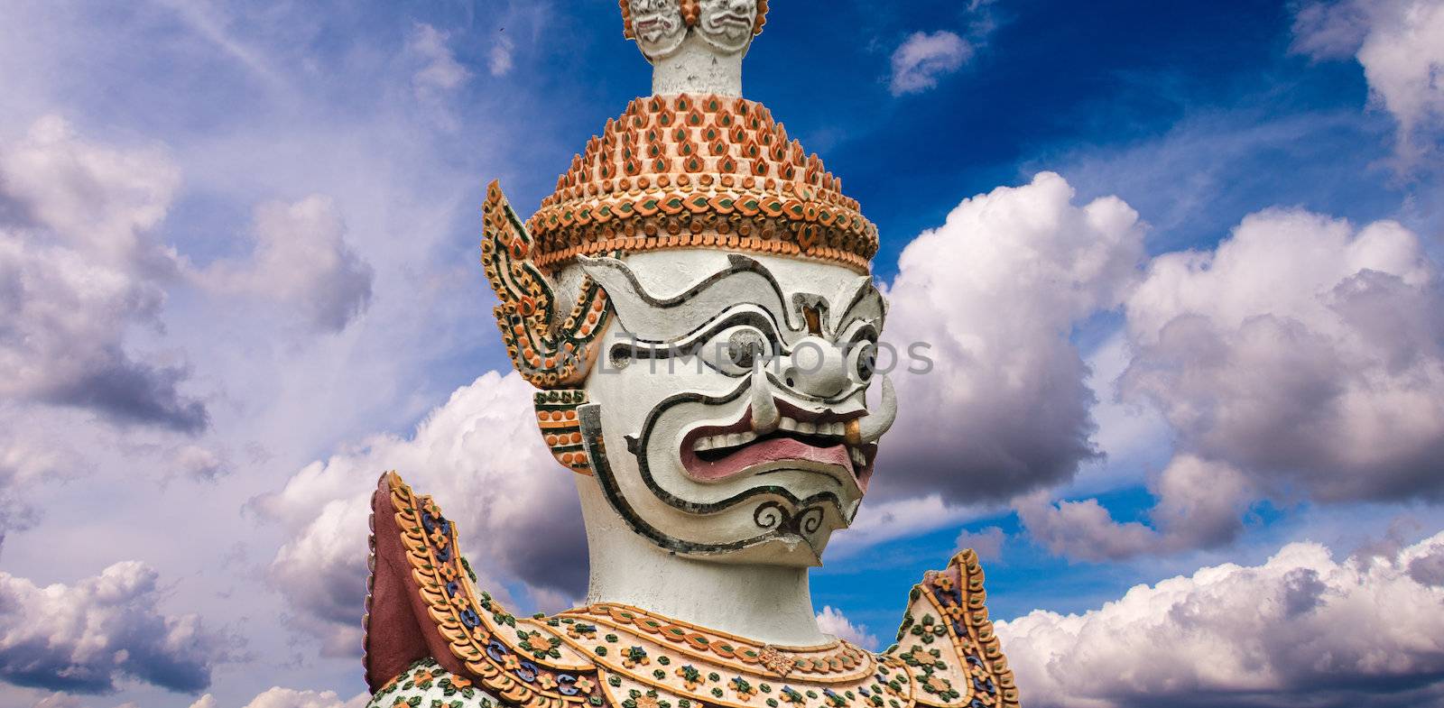The Guardian Statue - Bangkok. Beautiful side view with colourful sky.
