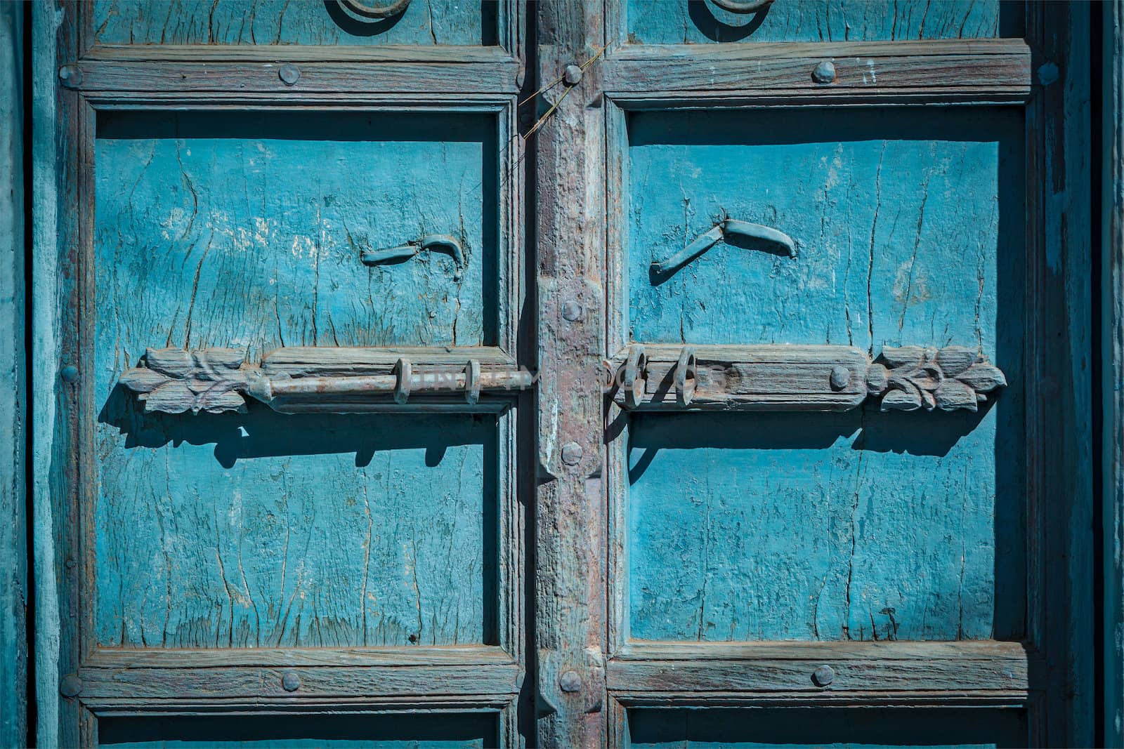 Latch with padlock on door in India