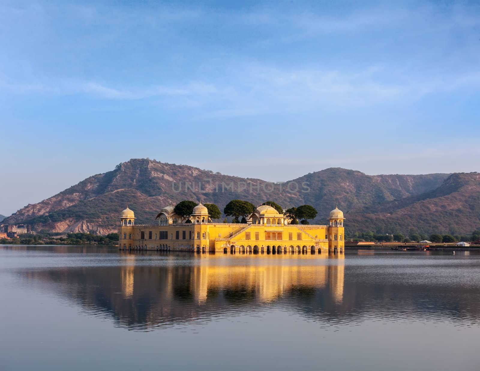 Rajasthan landmark - Jal Mahal (Water Palace) on Man Sagar Lake on sunset.  Jaipur, Rajasthan, India