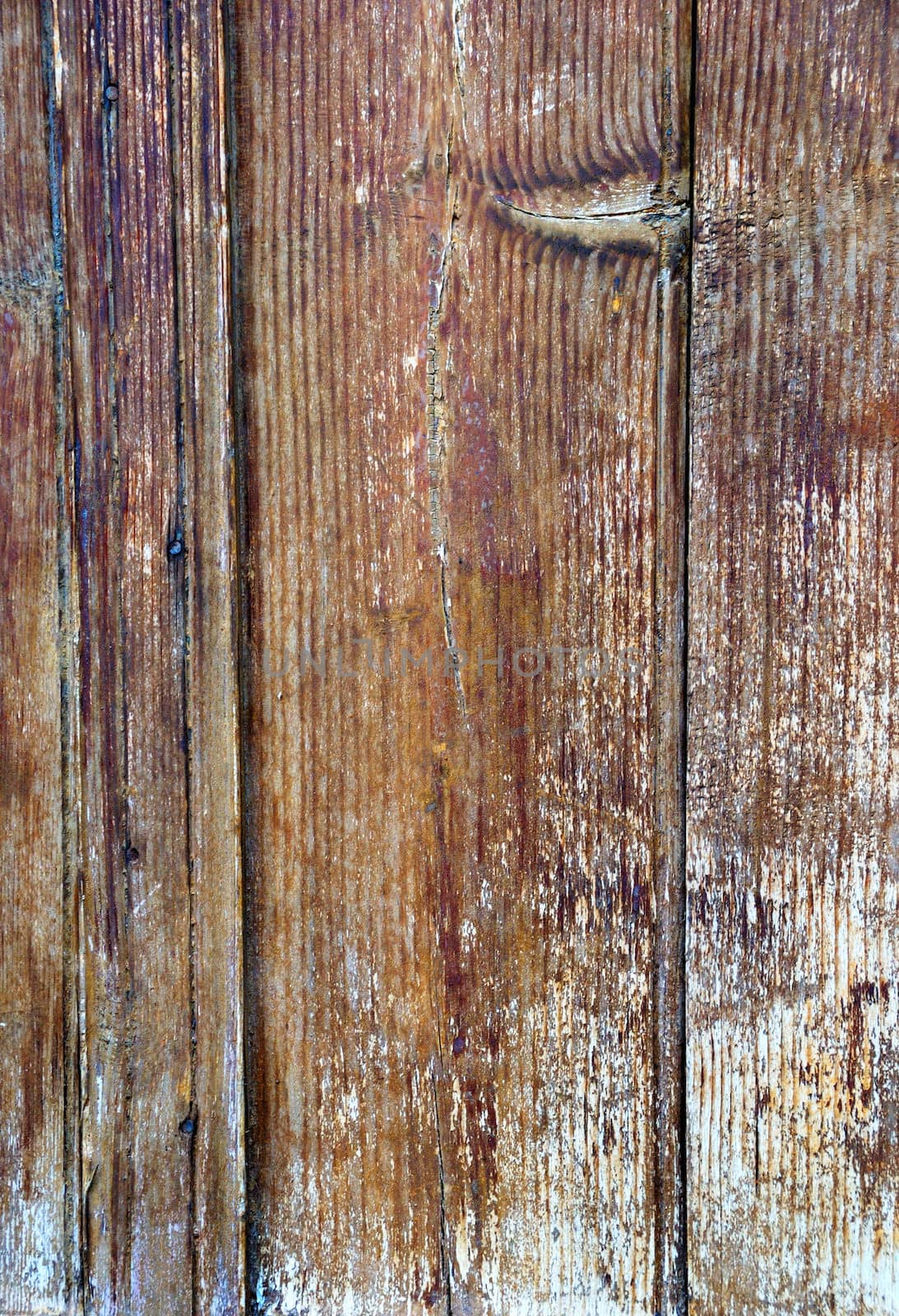 Old grungy wooden background with a color appearance