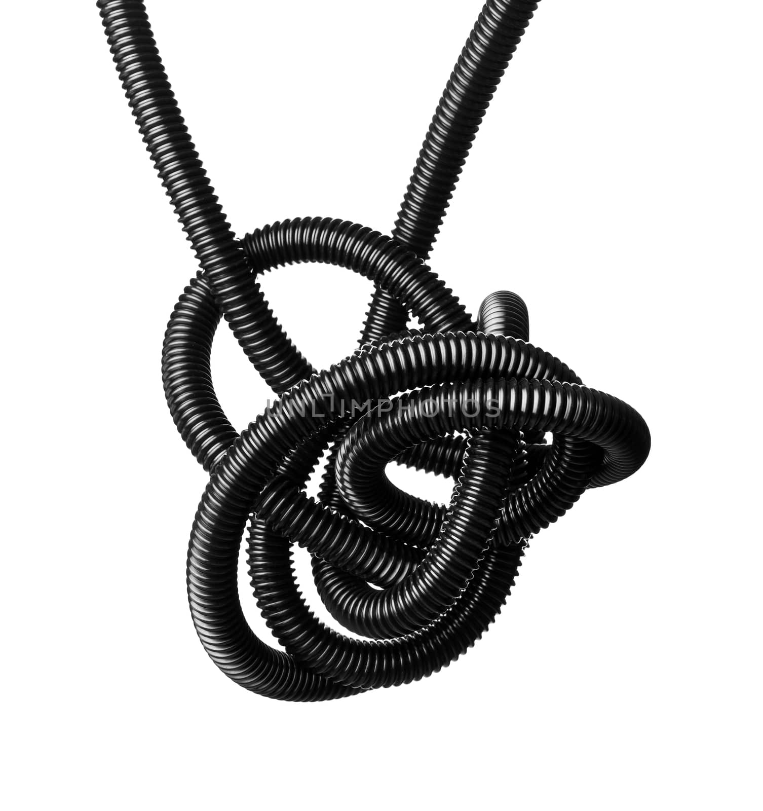 Black and white image of a black tangled flexible hose.