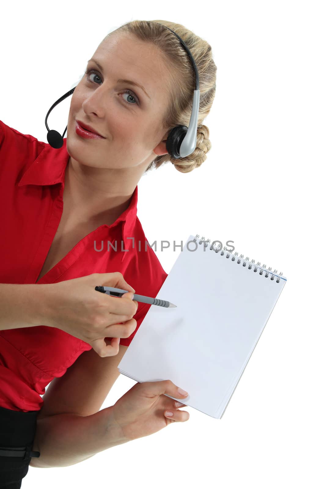 businesswoman holding a block note by phovoir